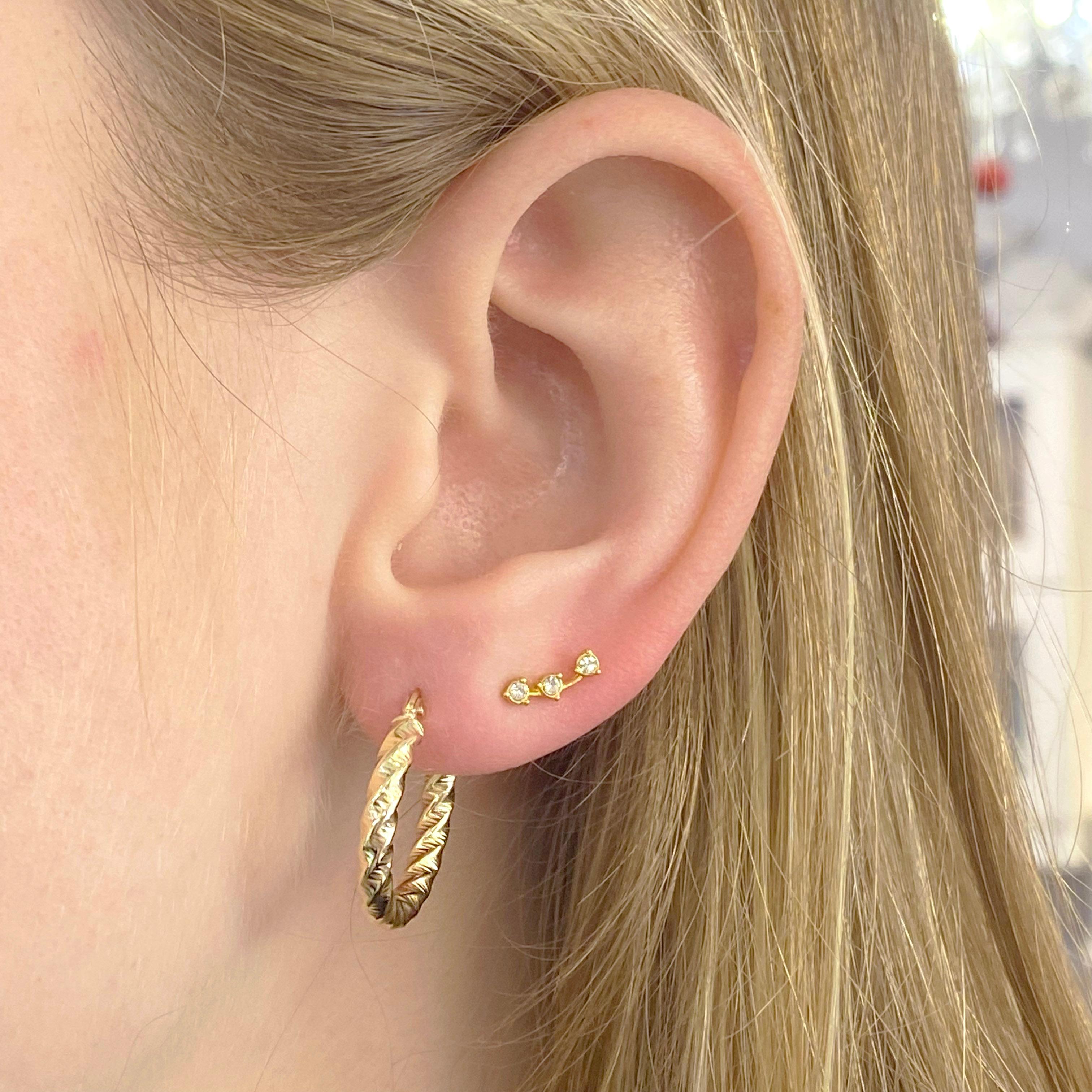 large twisted gold hoop earrings