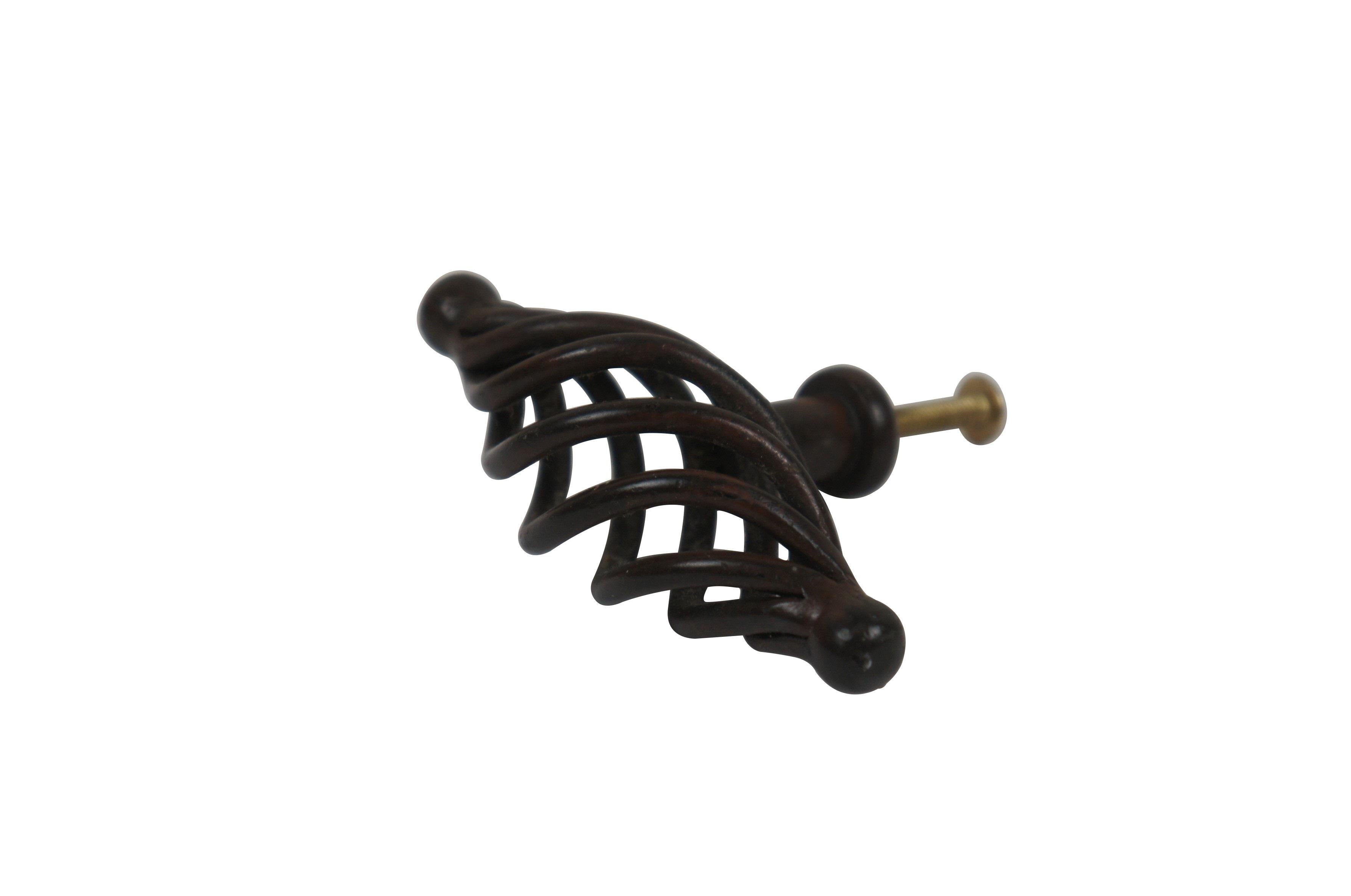 12 Available - Twisted metal oval / oblong birdcage style cabinet / drawer pull / knob, finished in deep brown / dark bronze. 

Dimensions:
3.5