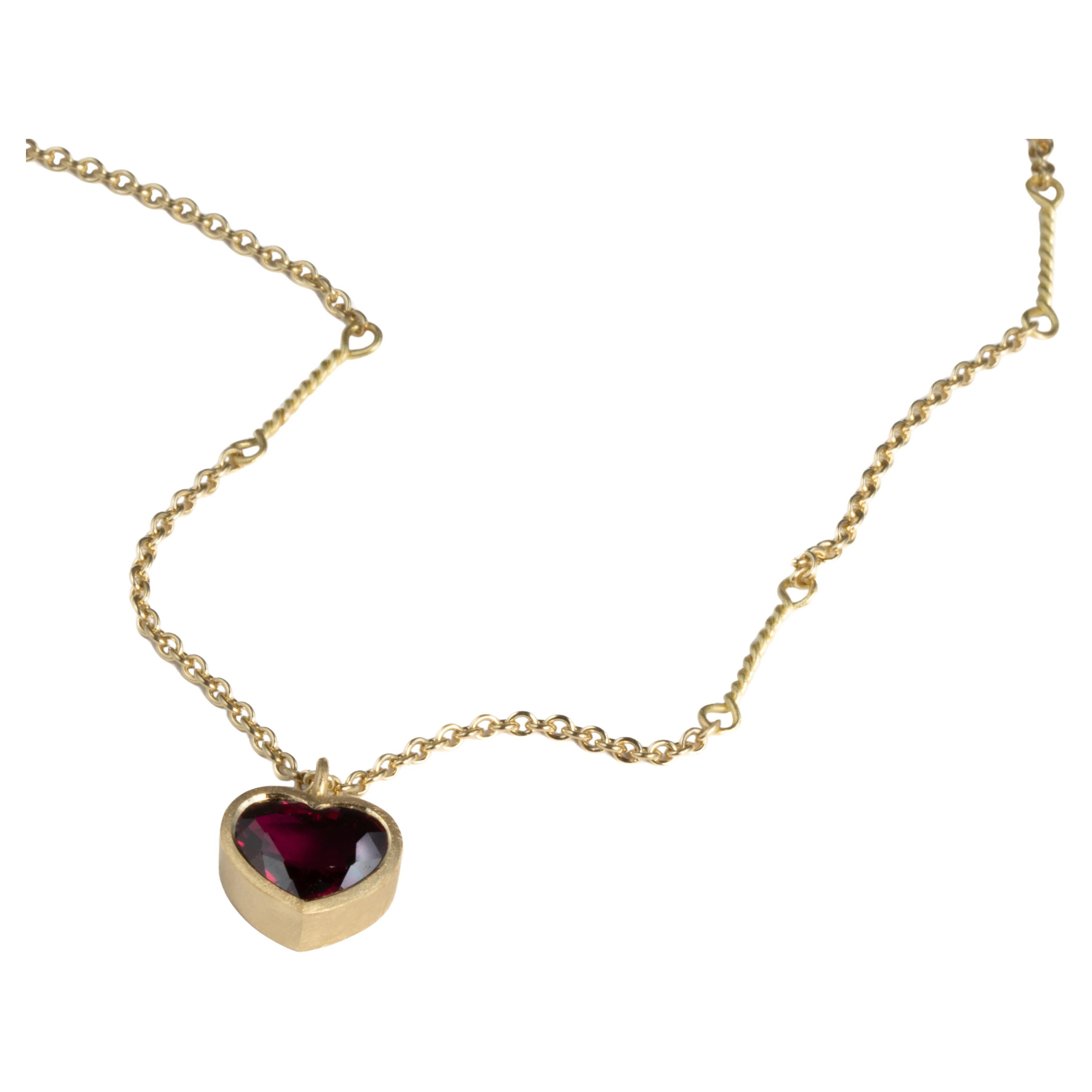 twisted link necklace with 18ct gold set heart shaped ruby For Sale