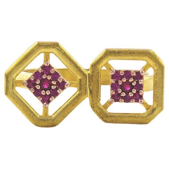 Verdrehter Omen-Ring aus antikem Doppelgold mit Rubin