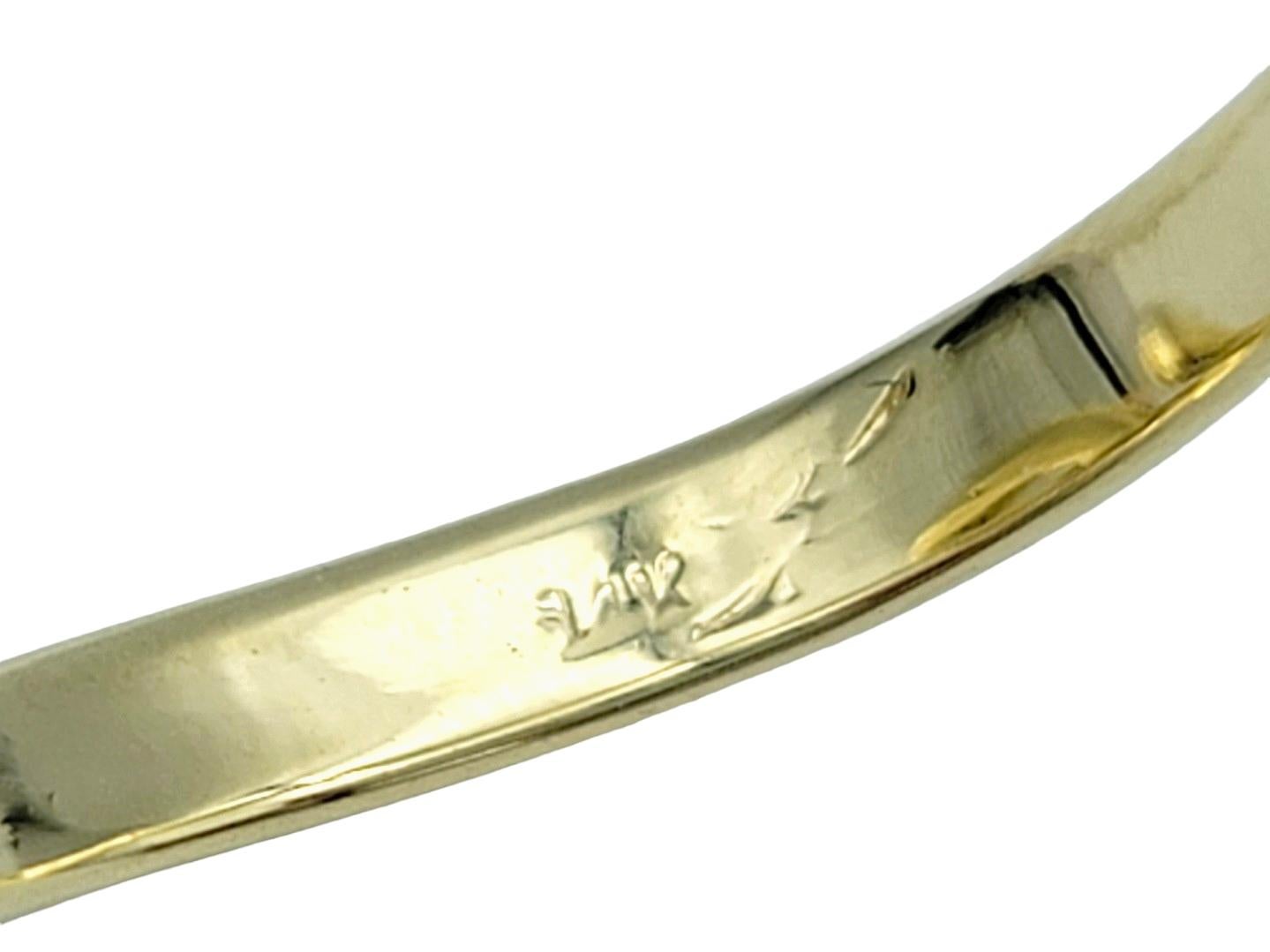 Anillo Serpiente Retorcida con Cabeza de Diamante y Ojos Verdes Engastado en Oro Amarillo de 14 Kilates en venta 4