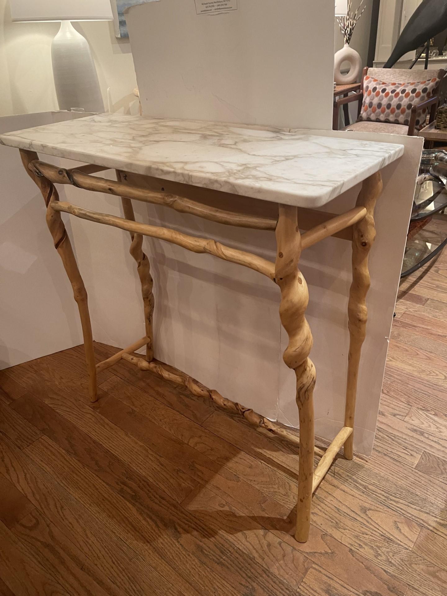 Studio crafted works by David Ebner. To date there were only two  works ever crafted  with marble tops in the sassafras wood group, making this console an extremely rare find. Immaculate condition and masterful craftsmanship. Click through the