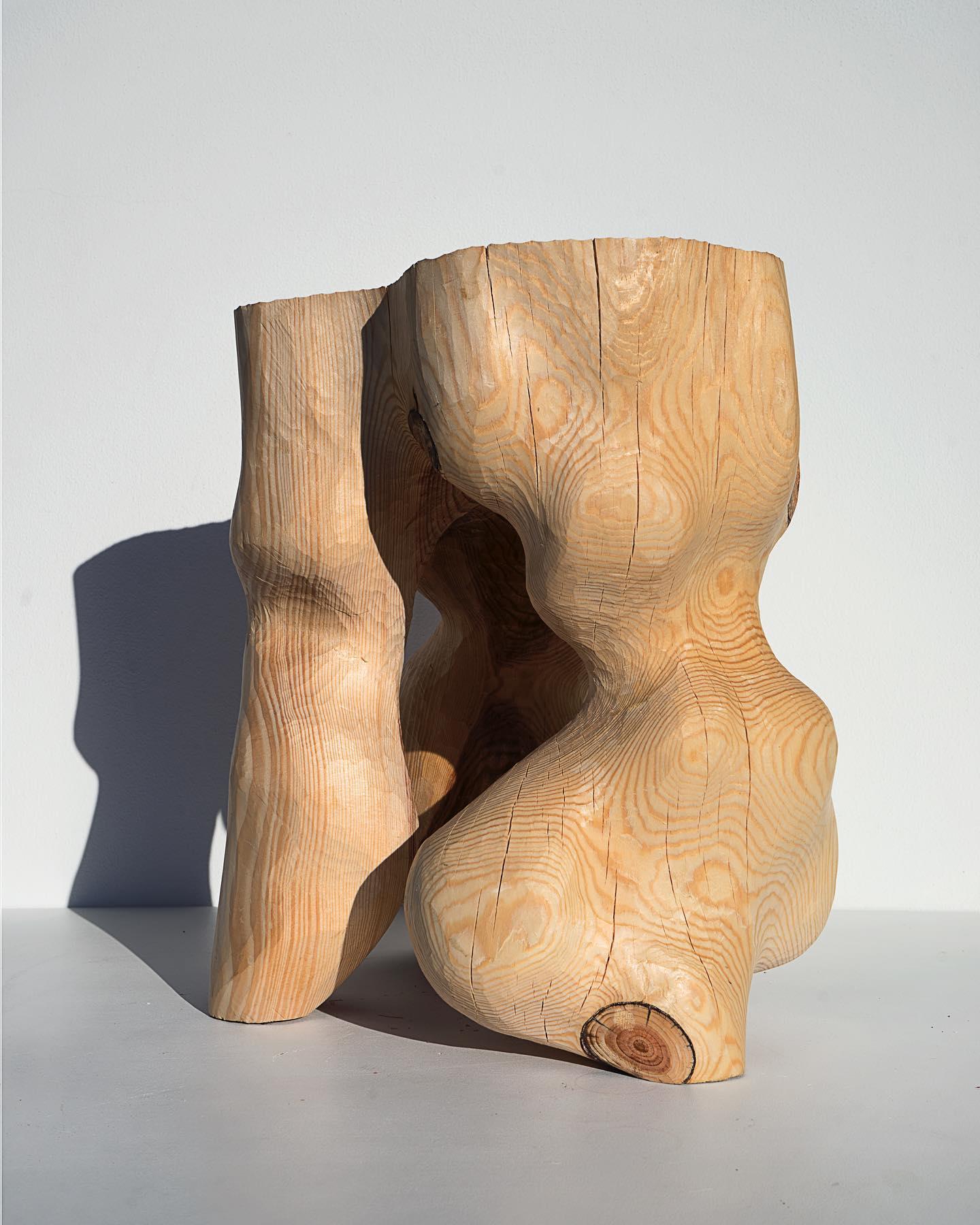 Twisted Table / Stool by Touch With Eyes
Dimensions: W 40 x D 40 x H 45 cm
Materials: Wood, from pine tree, Wax and Oil. 
Weight: 20 Kg. 

The chair was made from pine tree that felll after the storm. The wood was processed by hands without the use