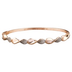 Bracelet en or massif 18k avec diamants torsadés et ondulés