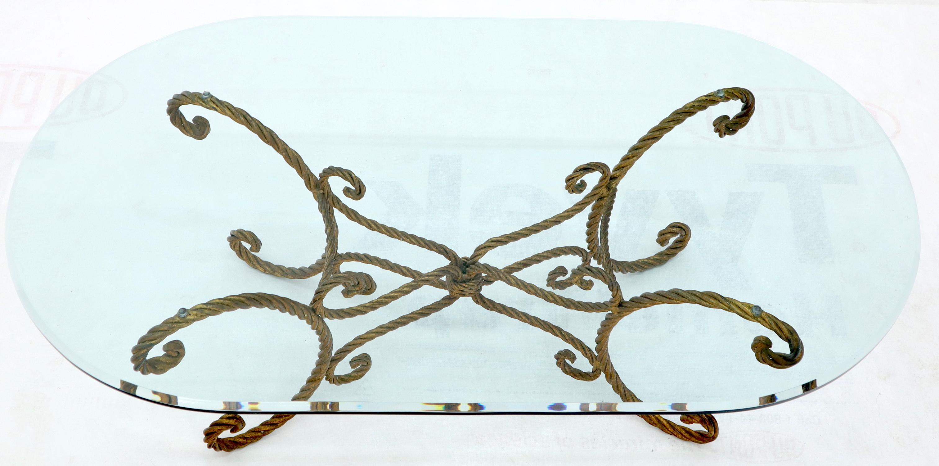 oval wrought iron coffee table with glass top