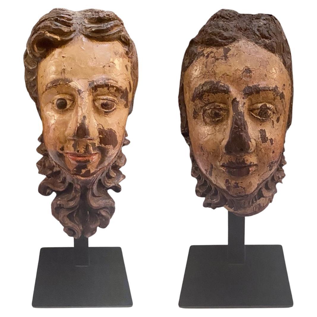 Two 17th-Century European Polychrome Wood Sculptures of the Heads of Saints