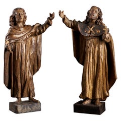 Used Two 18th Century Spanish Wooden Gilded Sculptures of Pilgrims Holding a Cross