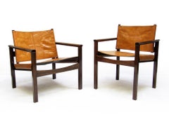 Two 1950s Brazilian "Peg-Lev" Safari Chairs in Sipo & Leather by Michel Arnoult