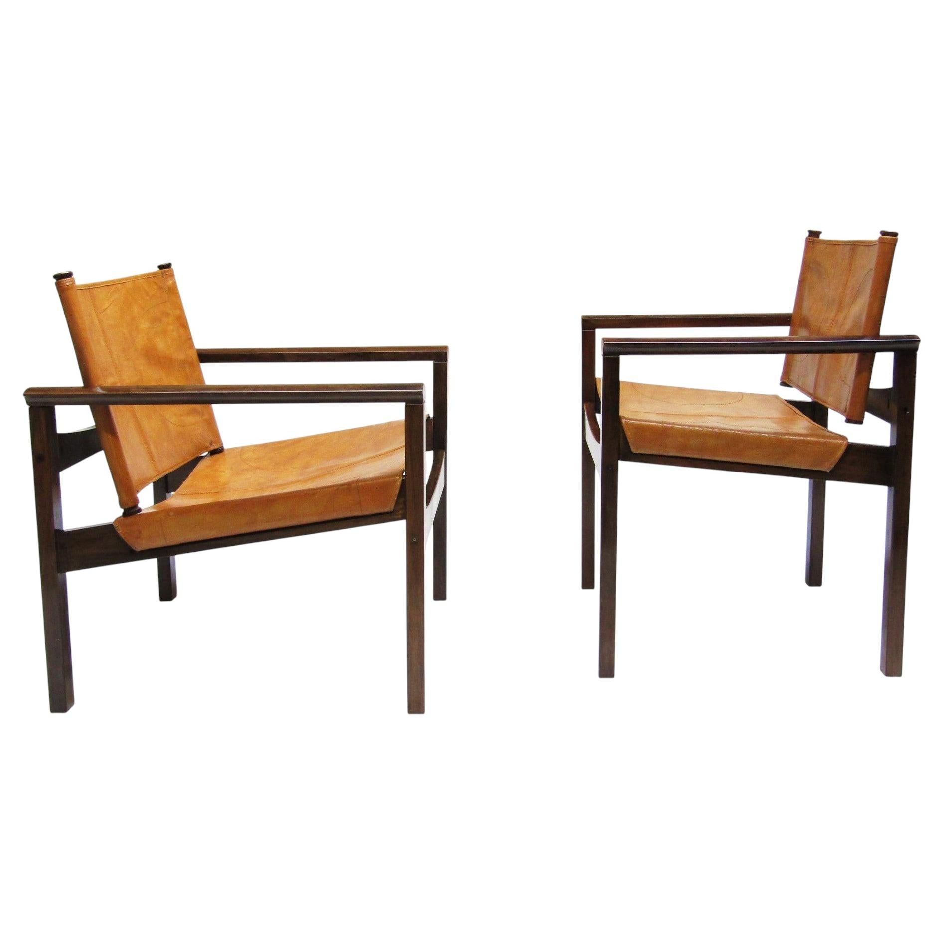 Two 1950s Brazilian "Peg-Lev" Safari Chairs in Sipo & Leather by Michel Arnoult