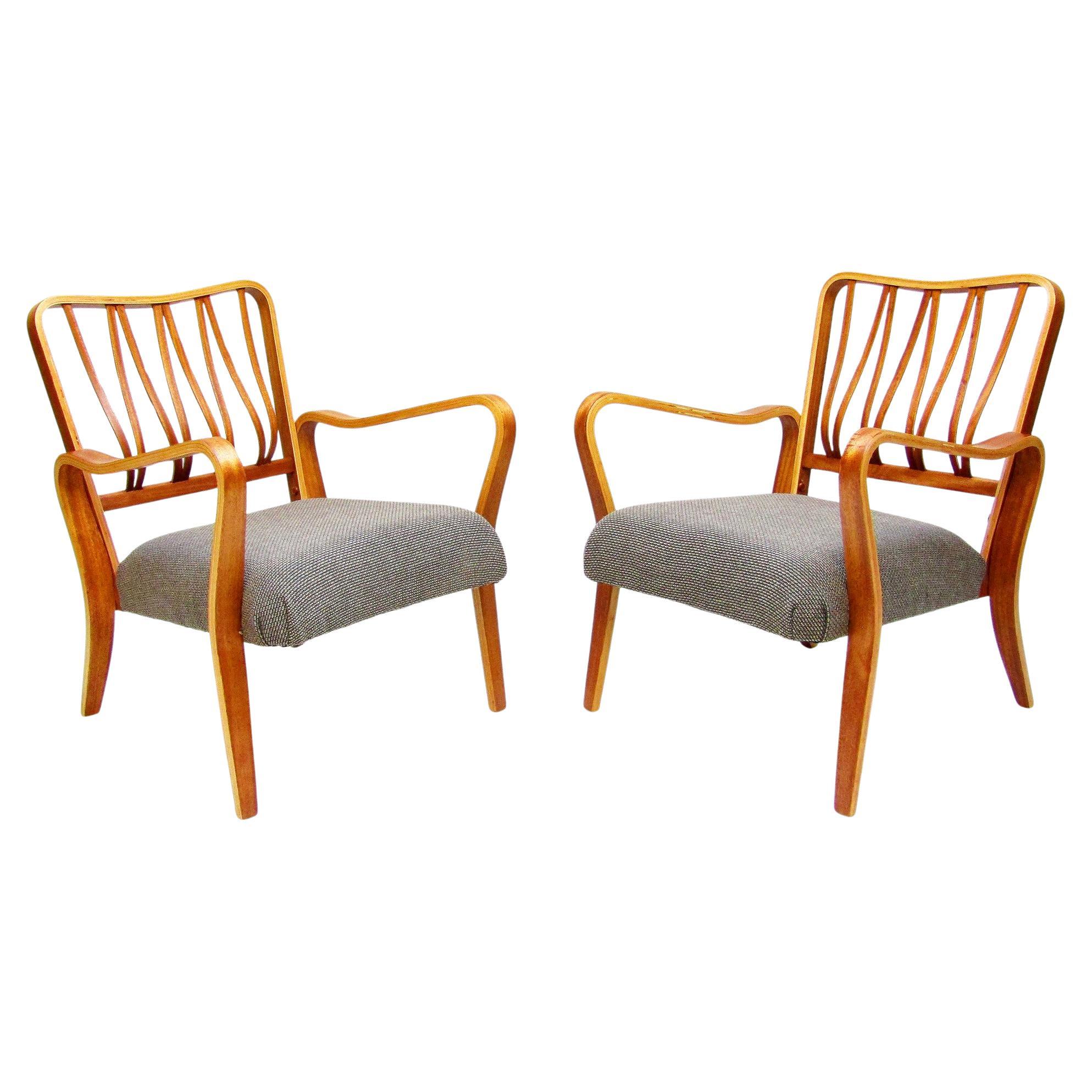 Dos tumbonas británicas "Linden" de teca de los años 50, por G A Jenkins en venta