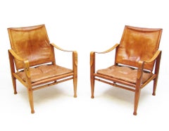 Two 1950s Danish Safari Chairs in Oak and Tan Leather by Kaare Klint