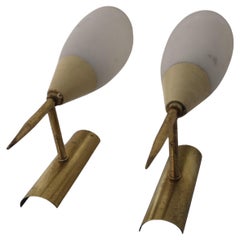 Two 1950s Italian Stilnovo style wall lights in brass and opaline glass