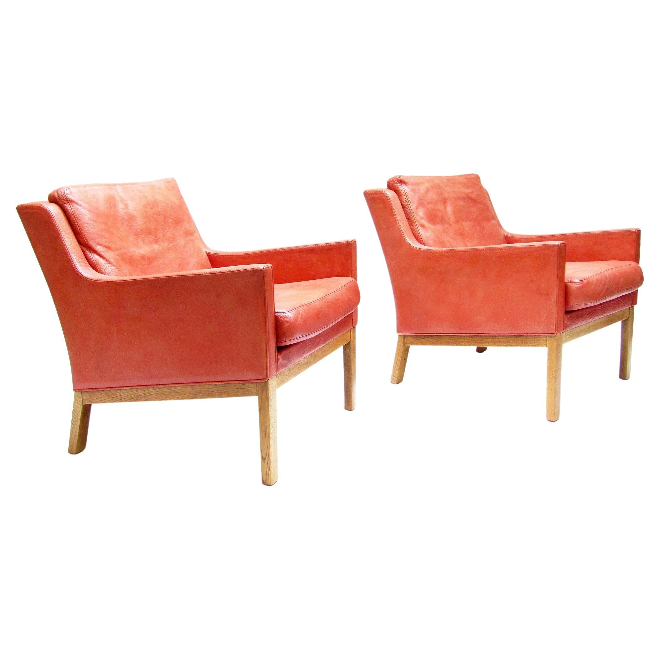 Two 1960s Danish Lounge Chairs in Leather & Oak by Kai Lyngfeldt Larsen