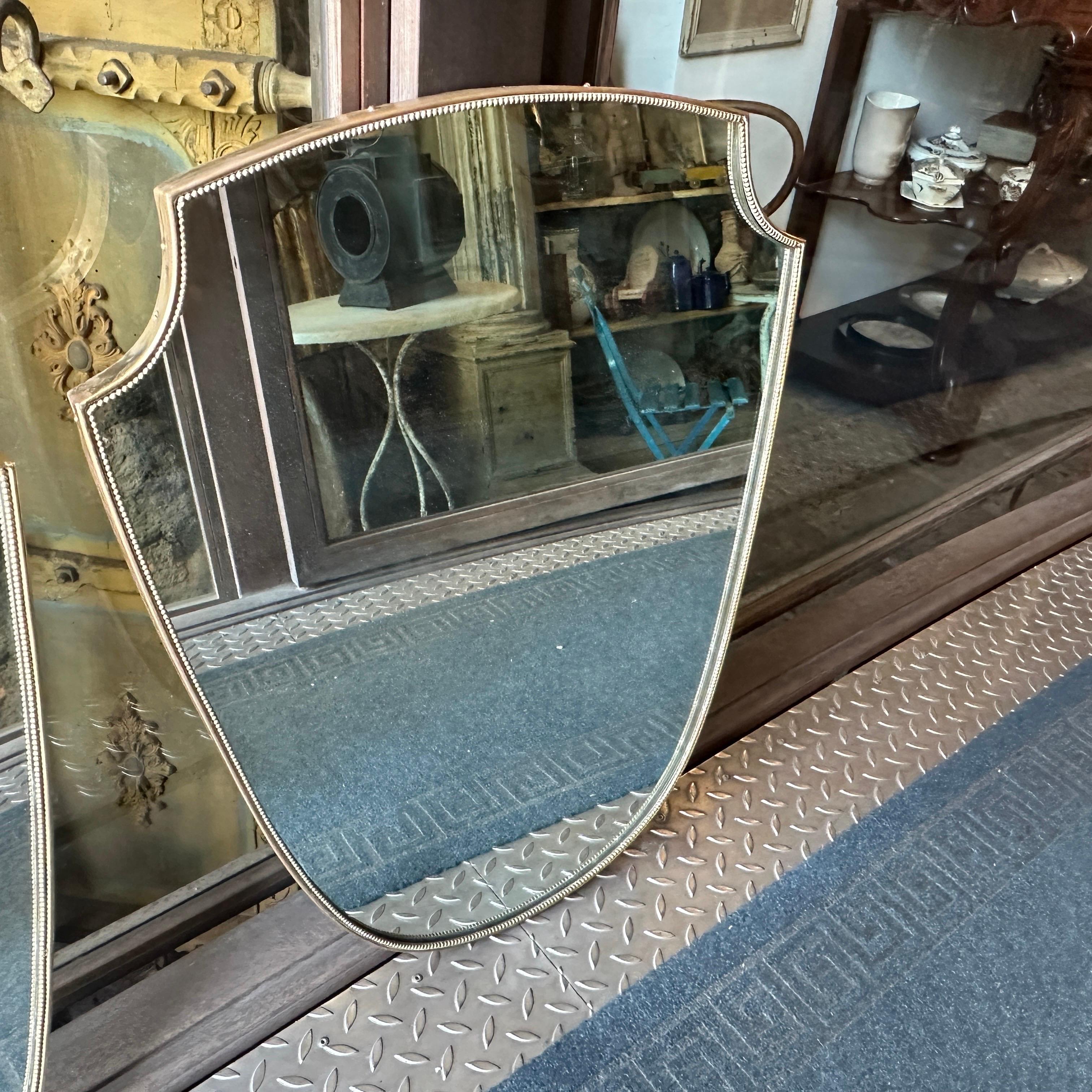 Two 1960s Gio Ponti Style Mid-Century Modern Brass Shield Shaped Italian Mirrors 1