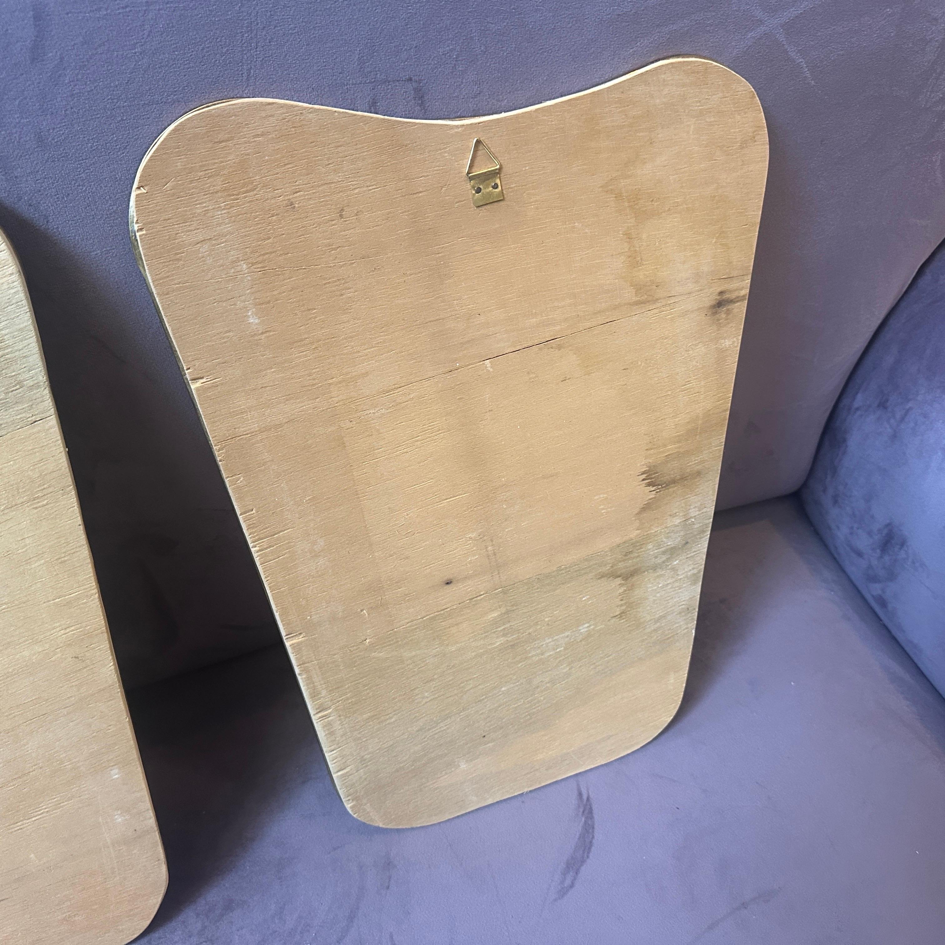 Dos espejos de pared de latón con forma de galleta de la década de 1970, estilo Gio PontiModerno de mediados de siglo Hecho a mano en venta