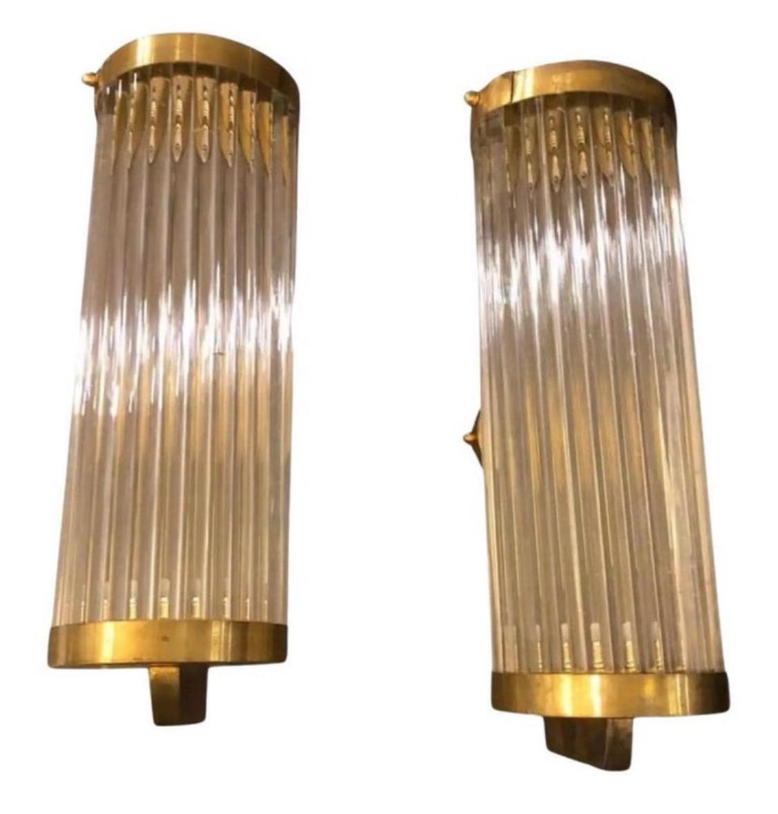 Two brass and glass wall sconces designed and manufactured in Italy in the late 20th century, electrical parts are fully restored, brass parts have been cleaned, the tube glasses can be removed to replace the bulb. The main material for the frame is