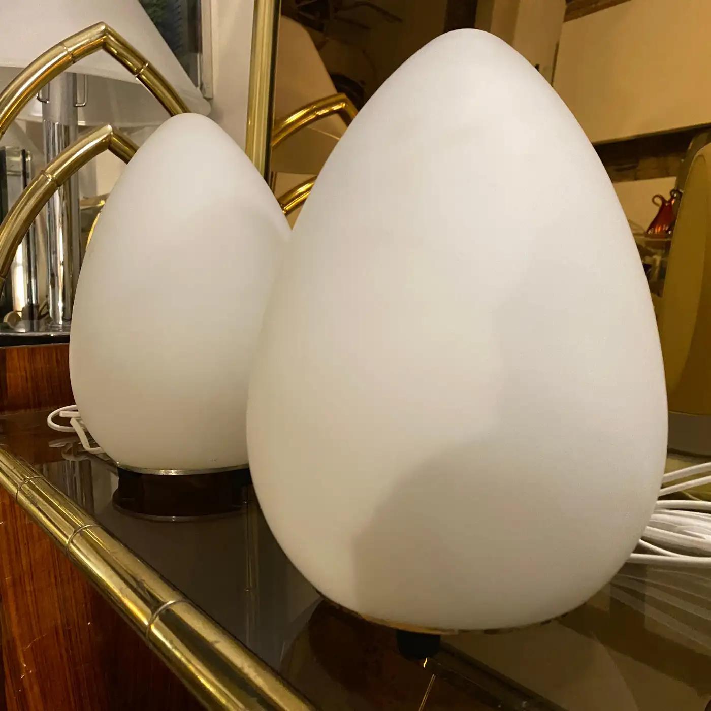Space Age Two 1990s Modernist Opaline White Glass Italian Egg Bed Lamps by Lumen Center For Sale