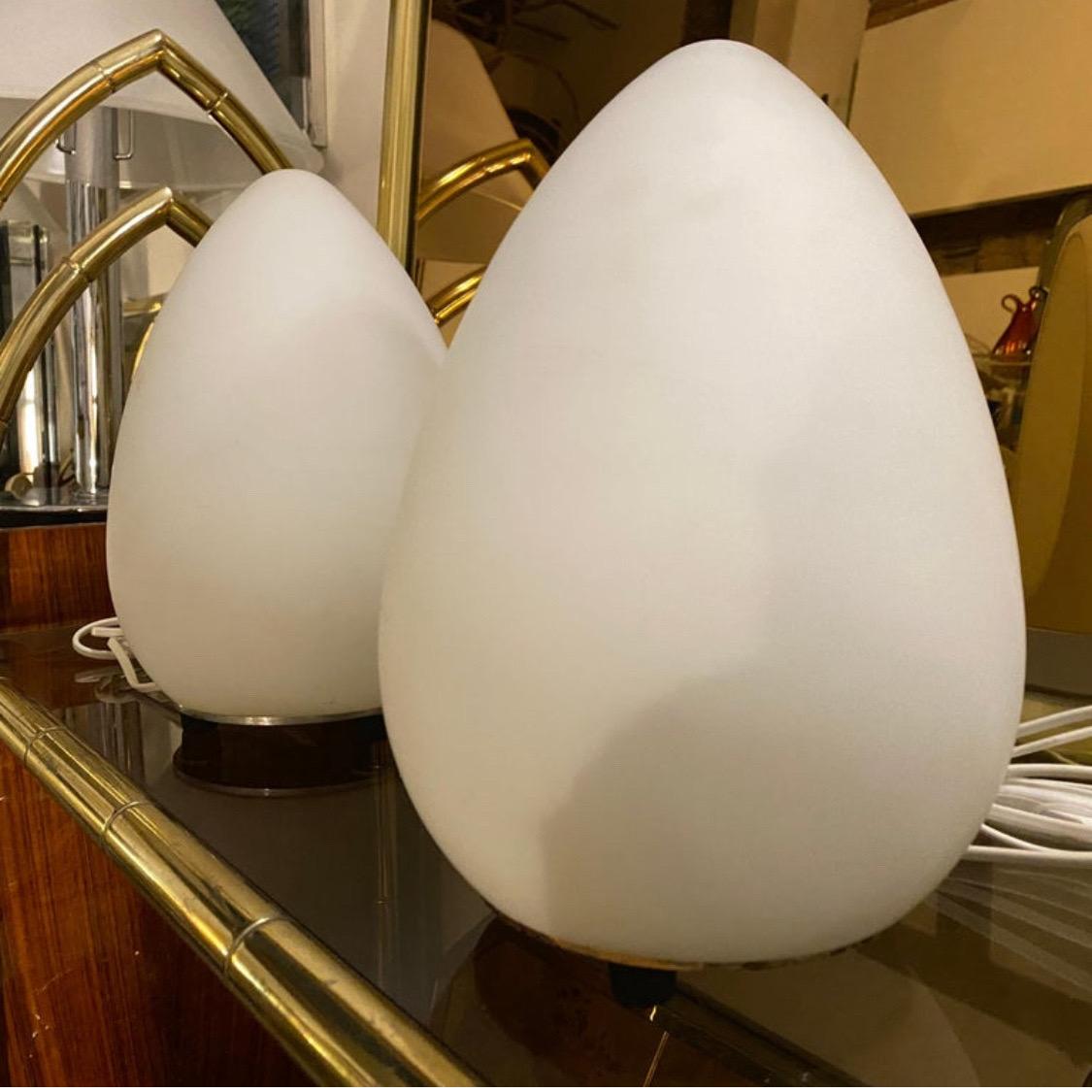 20th Century Two 1990s Modernist Opaline White Glass Italian Egg Bed Lamps by Lumen Center For Sale