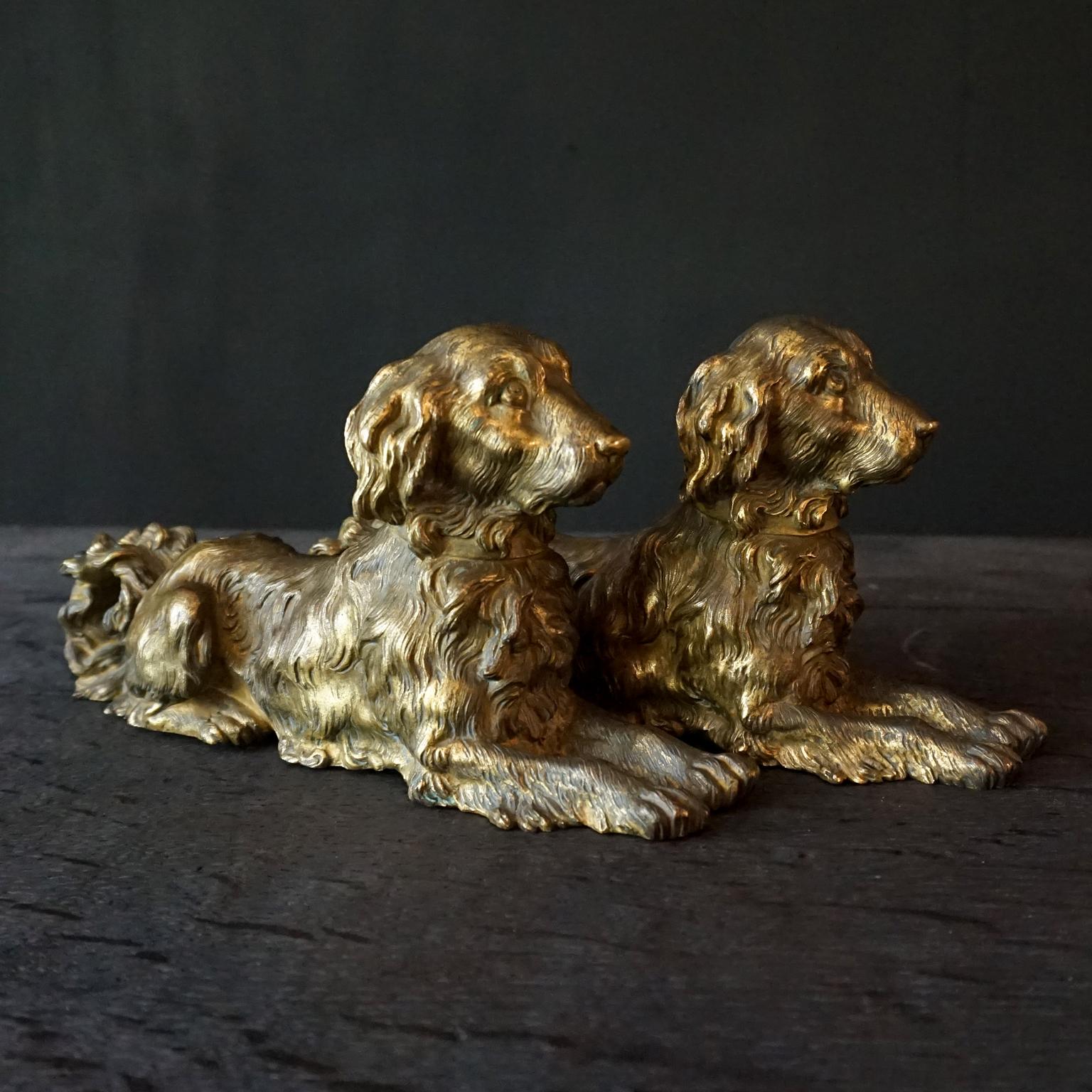 Very decorative couple of hunting dogs in lying position made out of very detailed solid cast brass. Because of the solidness they are quite heavy an easily could work as bookends or paperweights. I think Golden Retrievers are depicted here, but
