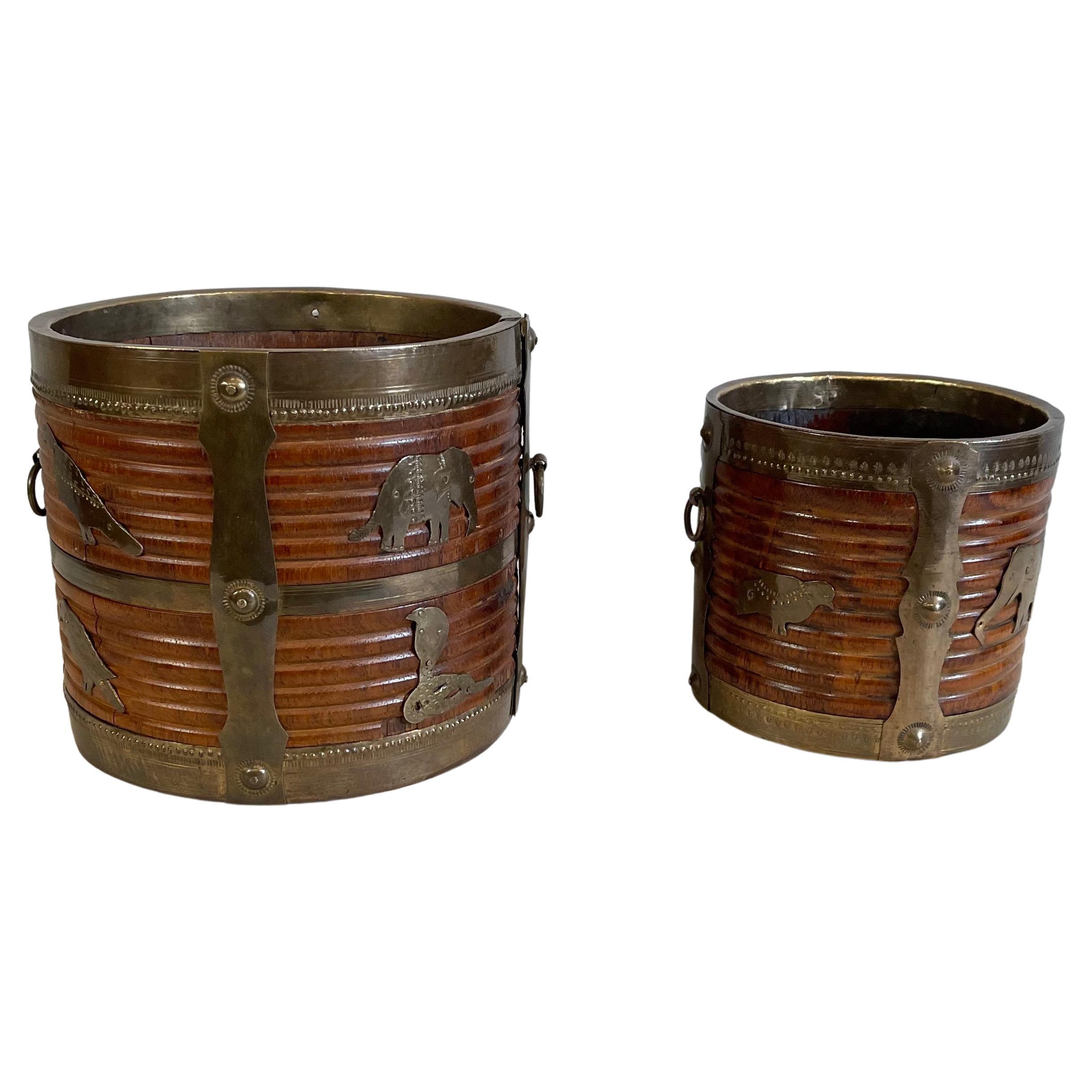 2 Antique 19th century Anglo Indian brass bound carved wood peat buckets with turned, reeded Design and applied brass animals. including, lovely patina, carved from a single piece of wood. Good condition - a minor age cracks.