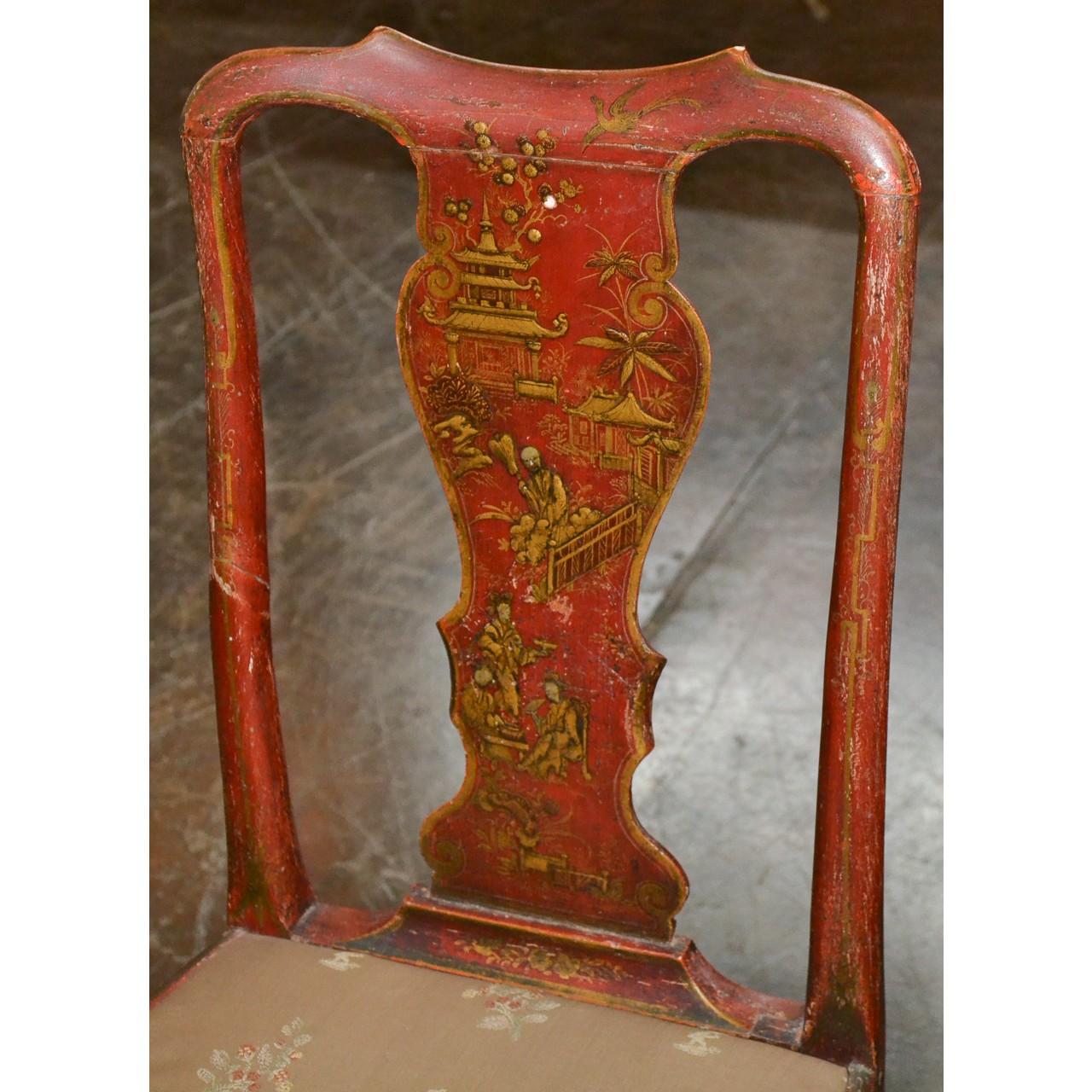 Two highly decorative 19th century English Queen Ann style side chairs with superb red and gold chinoiserie depicting Chinese motif landscape scenes with pagodas and Oriental figures. Shaped crest rails and splat backs. The front legs of cabriole