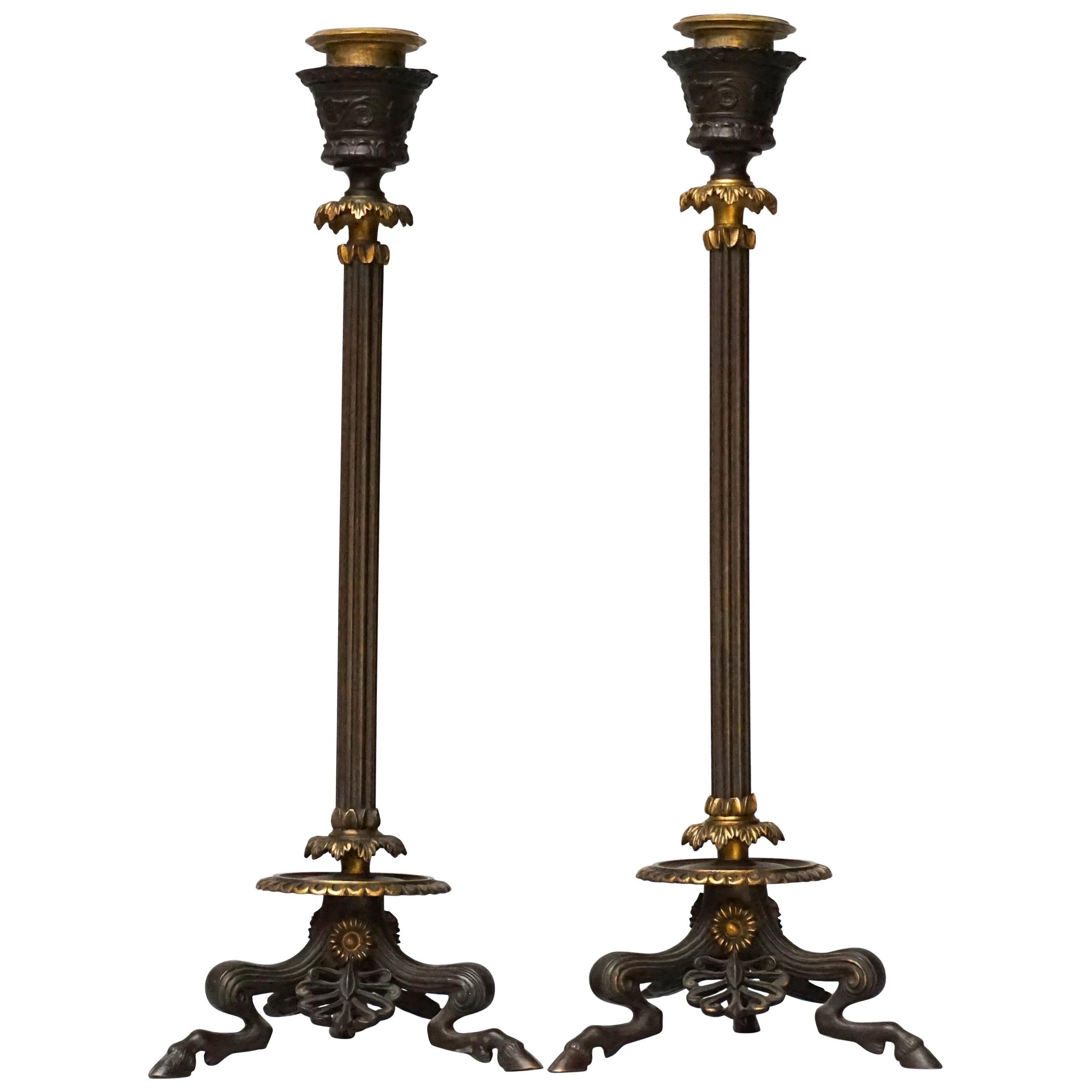 Two 19th Century French Bronze Partially Gilt Candlesticks on Hoofed Faun Feet For Sale