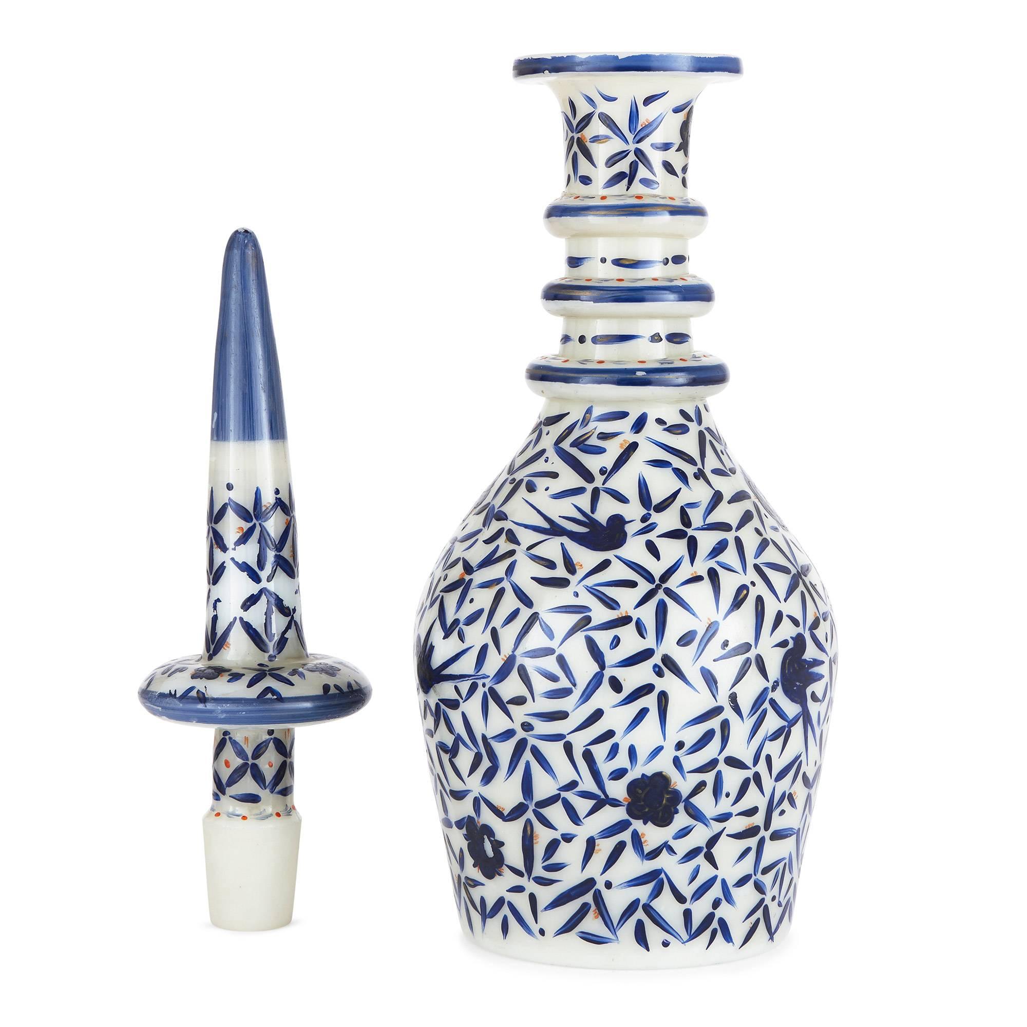 These charming antique Bohemian glass decanters are notable for their stunning blue and white patterning, and their endearing simplistic design, befitting both the antique interior and the modern alike. 

The decanters are of identical shape and