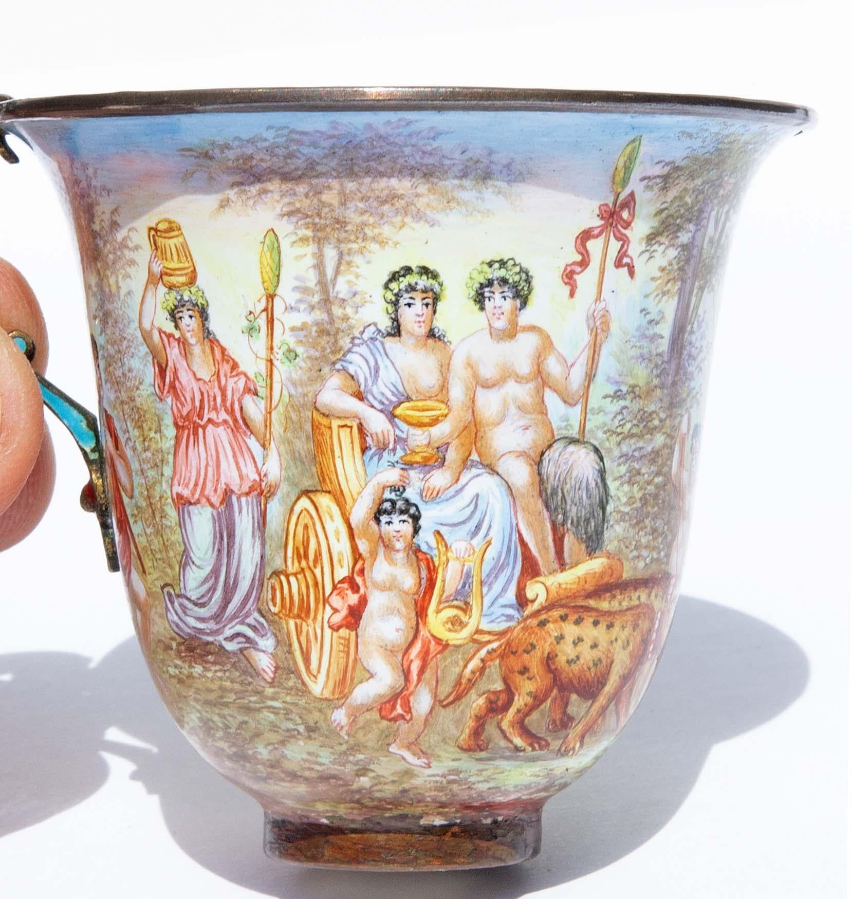 Two finely painted Vienna enameled silver pieces. Includes a cup with Bacchanalian scene and a ewer or vase dreaming maiden. Ewer measures 4.5