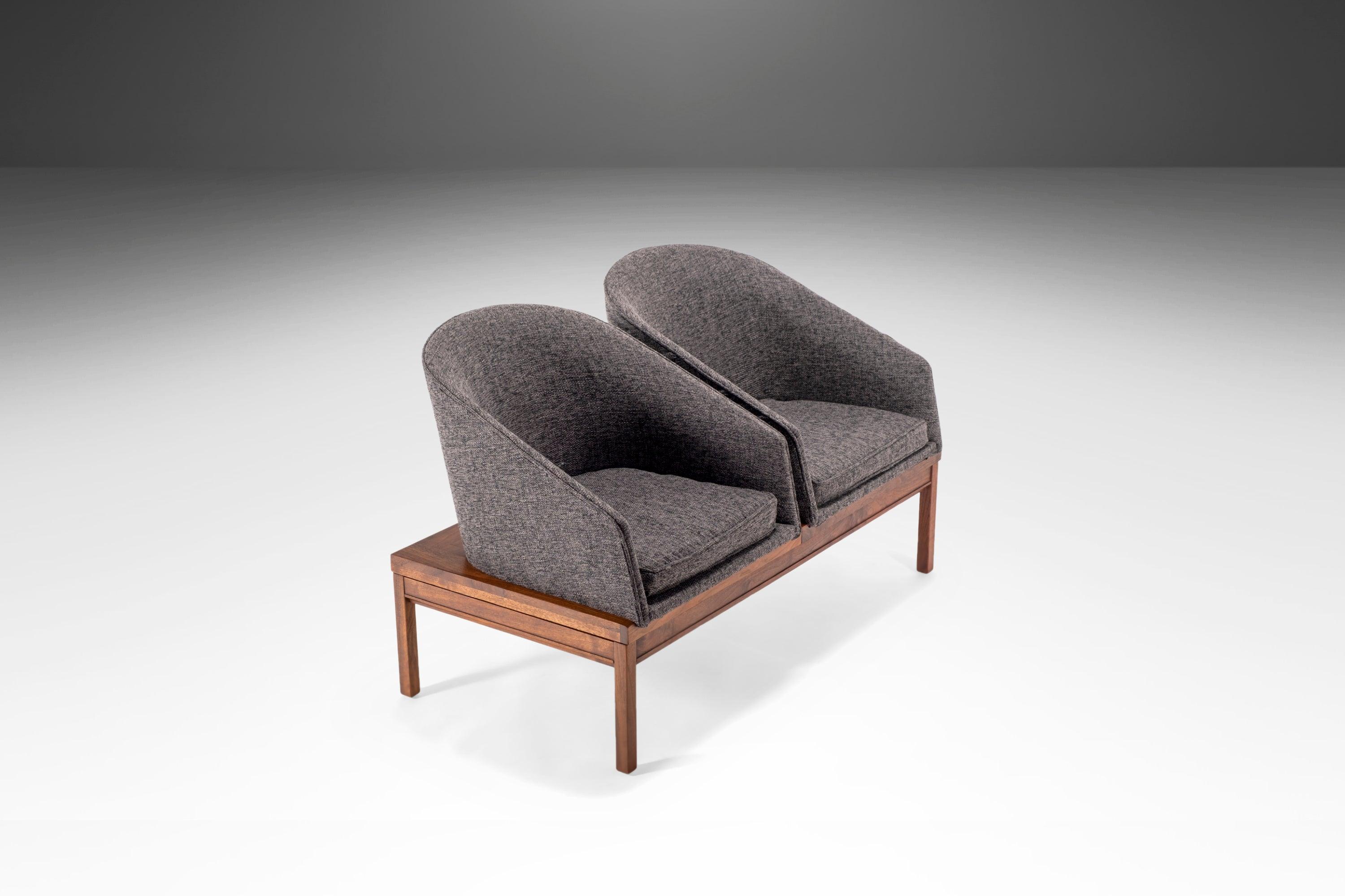 As comfortable as it is aesthetically pleasing this two-seater modular bench, designed by the acclaimed Arthur Umanoff, is newly upholstered and ready for your space. Famous for using natural materials and new methods to reimagine traditional
