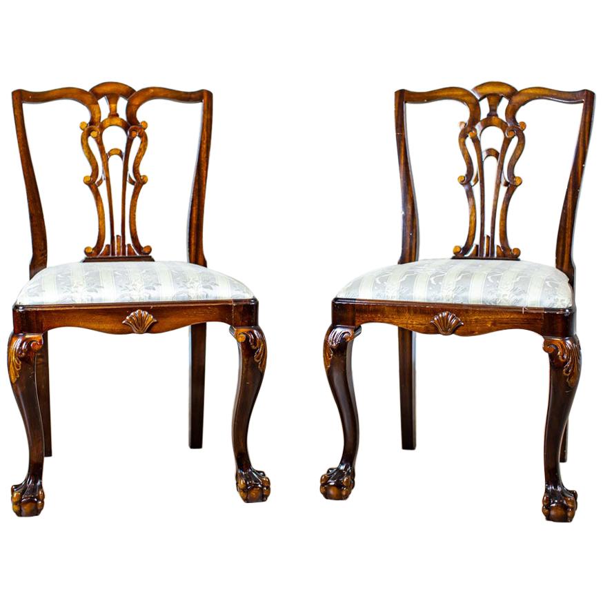 Two 20th-Century Chairs in the Chippendale Type Veneered with Walnut