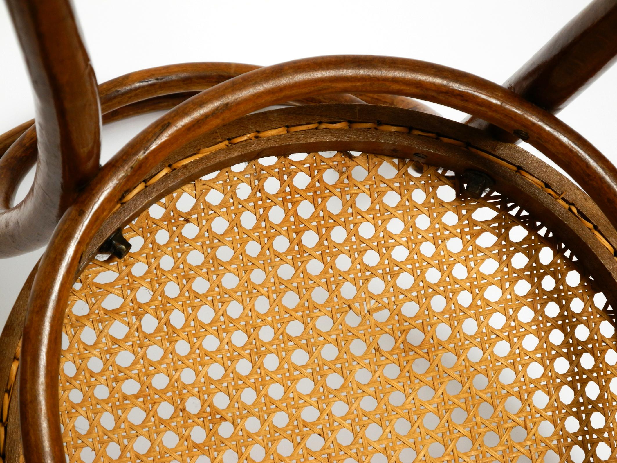 Two 30s coffee house chairs made of bentwood with cane weave by ZPM Radomsko 3