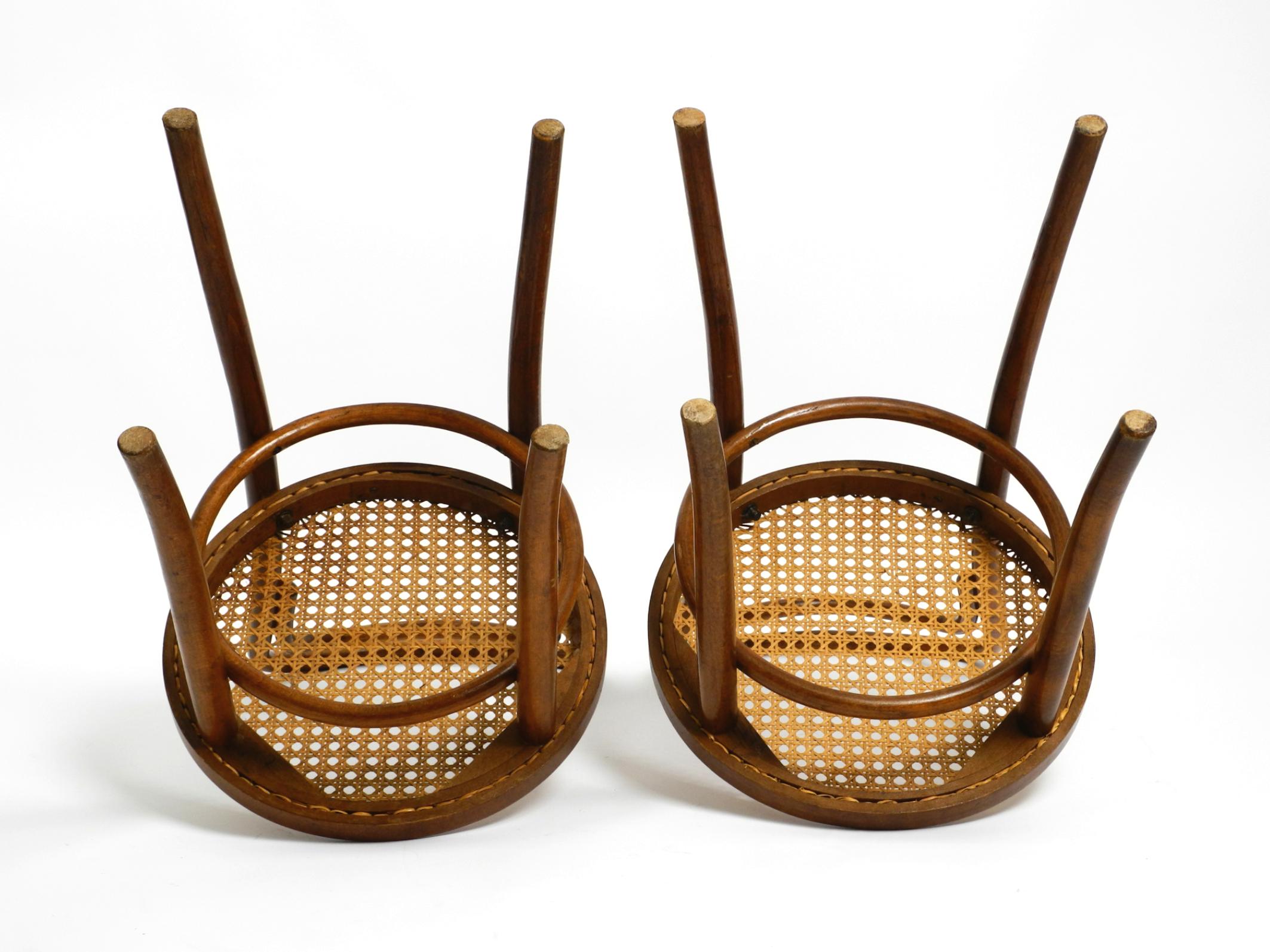 Two 30s coffee house chairs made of bentwood with cane weave by ZPM Radomsko 8