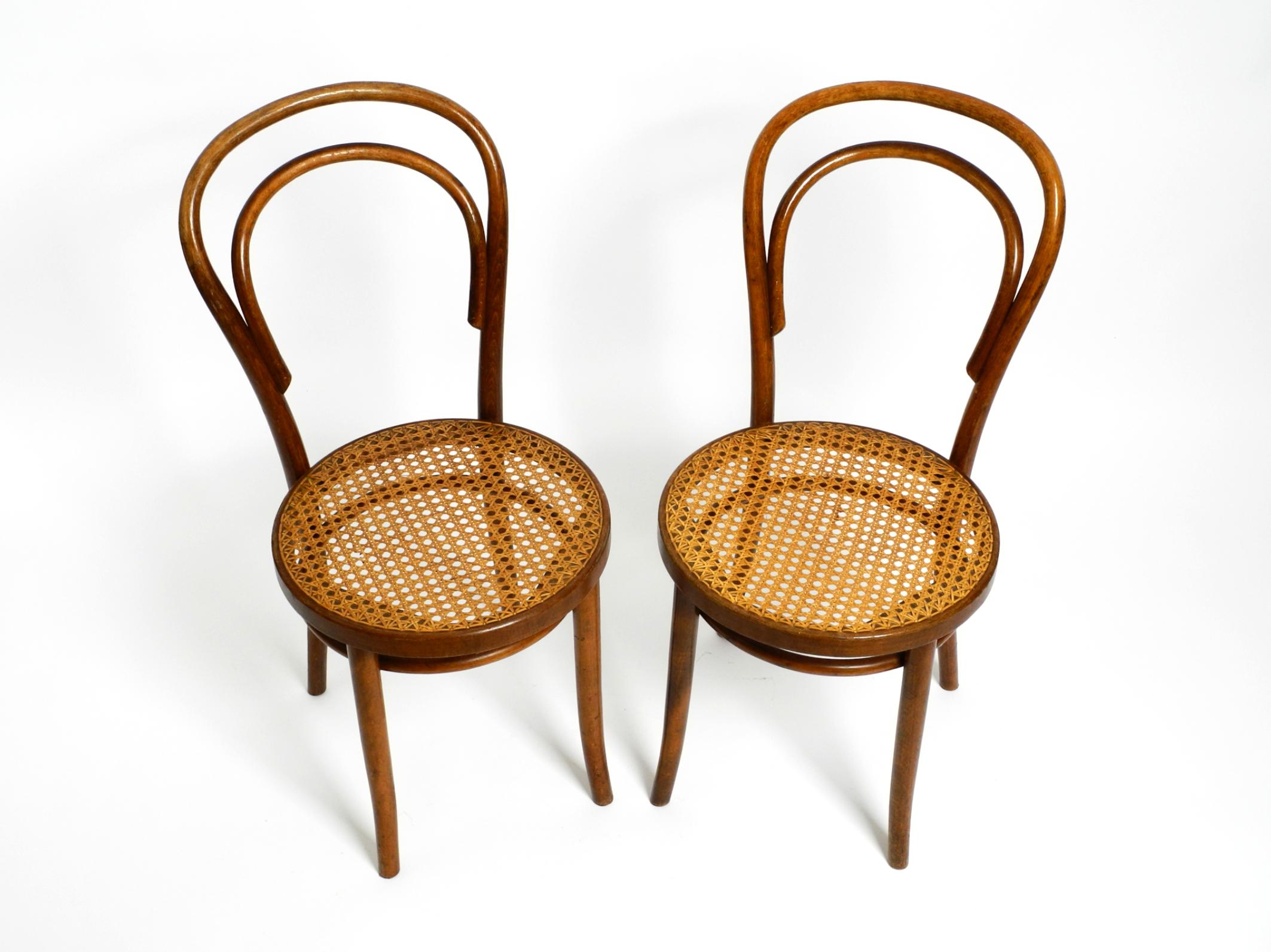 Polish Two 30s coffee house chairs made of bentwood with cane weave by ZPM Radomsko