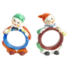 Antique Two Adorable Figural Towel Ring Holders