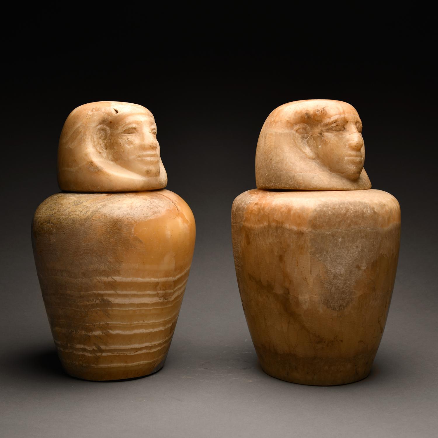 Two Ancient Egyptian Alabaster Canopic Jars In Excellent Condition For Sale In Los Angeles, CA