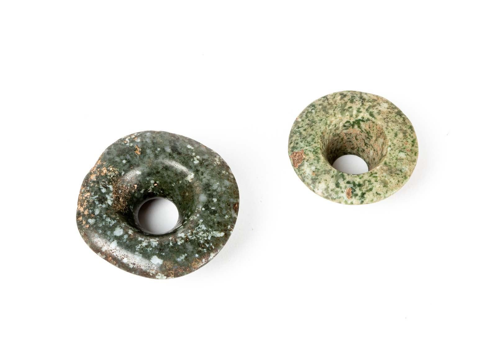 Light green carved jade plug is 0.75”x 2” diameter, dark green carved jade is 1”x2.5”.
