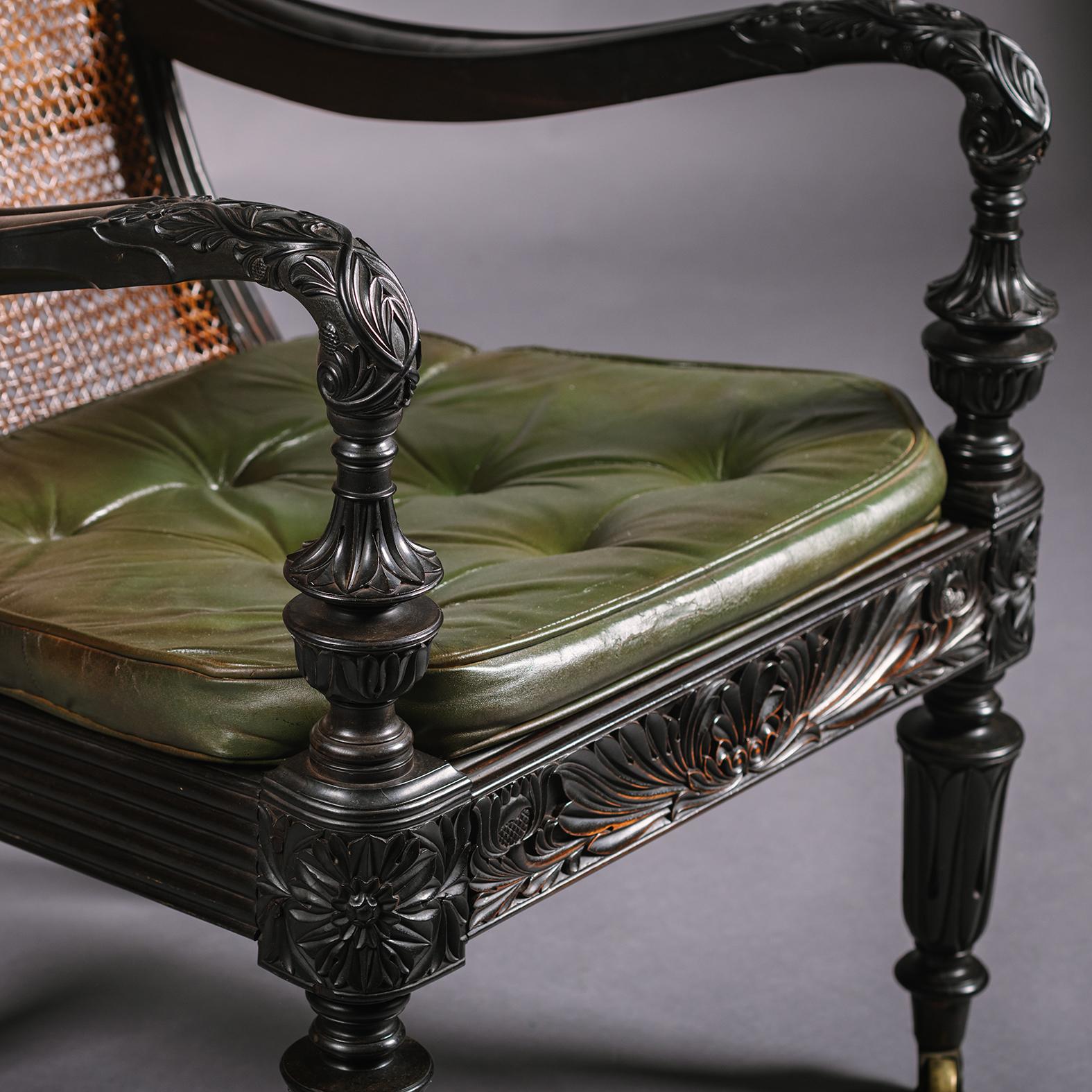 Two Anglo-Indian Carved Ebony Easy Armchairs For Sale 3