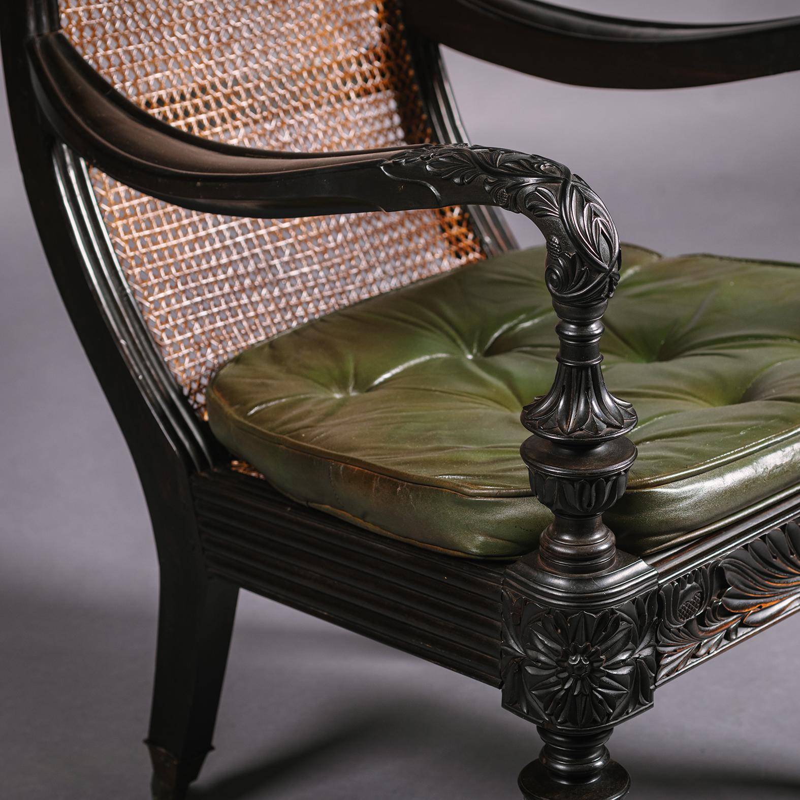 Two Anglo-Indian Carved Ebony Easy Armchairs For Sale 4