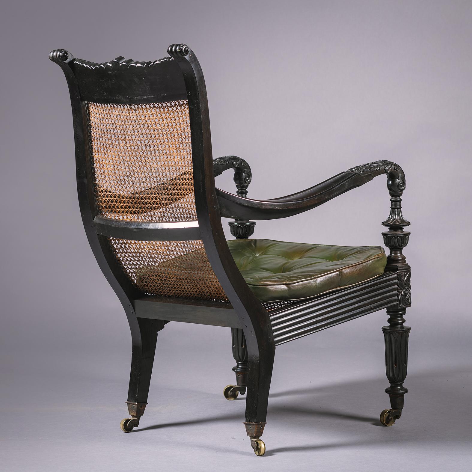 Two Anglo-Indian Carved Ebony Easy Armchairs For Sale 5