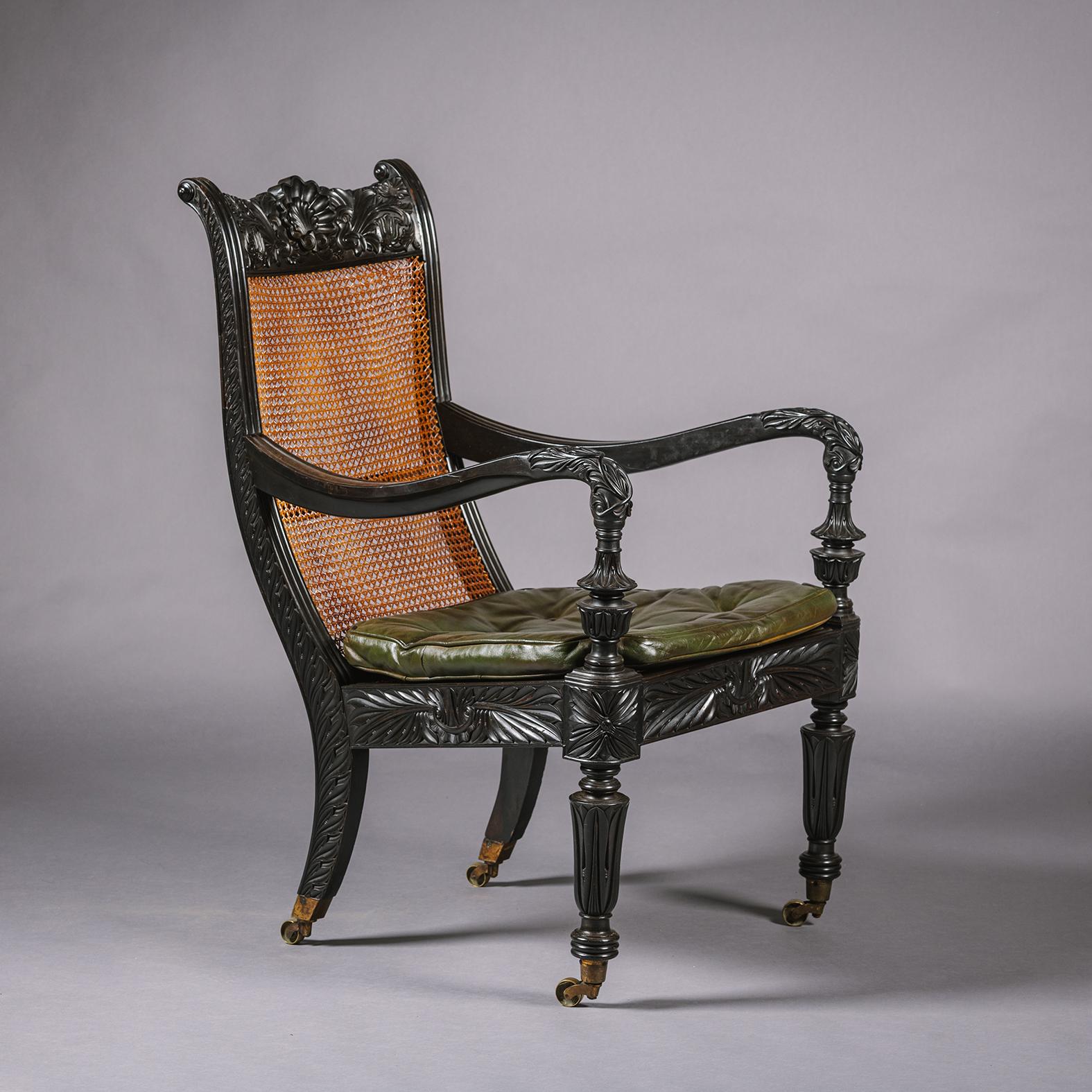 Hand-Carved Two Anglo-Indian Carved Ebony Easy Armchairs For Sale