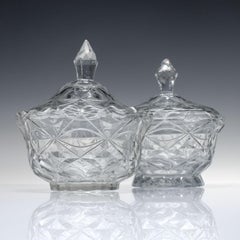 Two Anglo Irish Cork Cut Oval Glass Serving Bowls with Covers c1820
