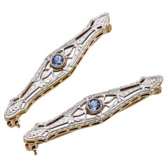 Due antiche spille a barretta in oro giallo 14k e platino con zaffiro