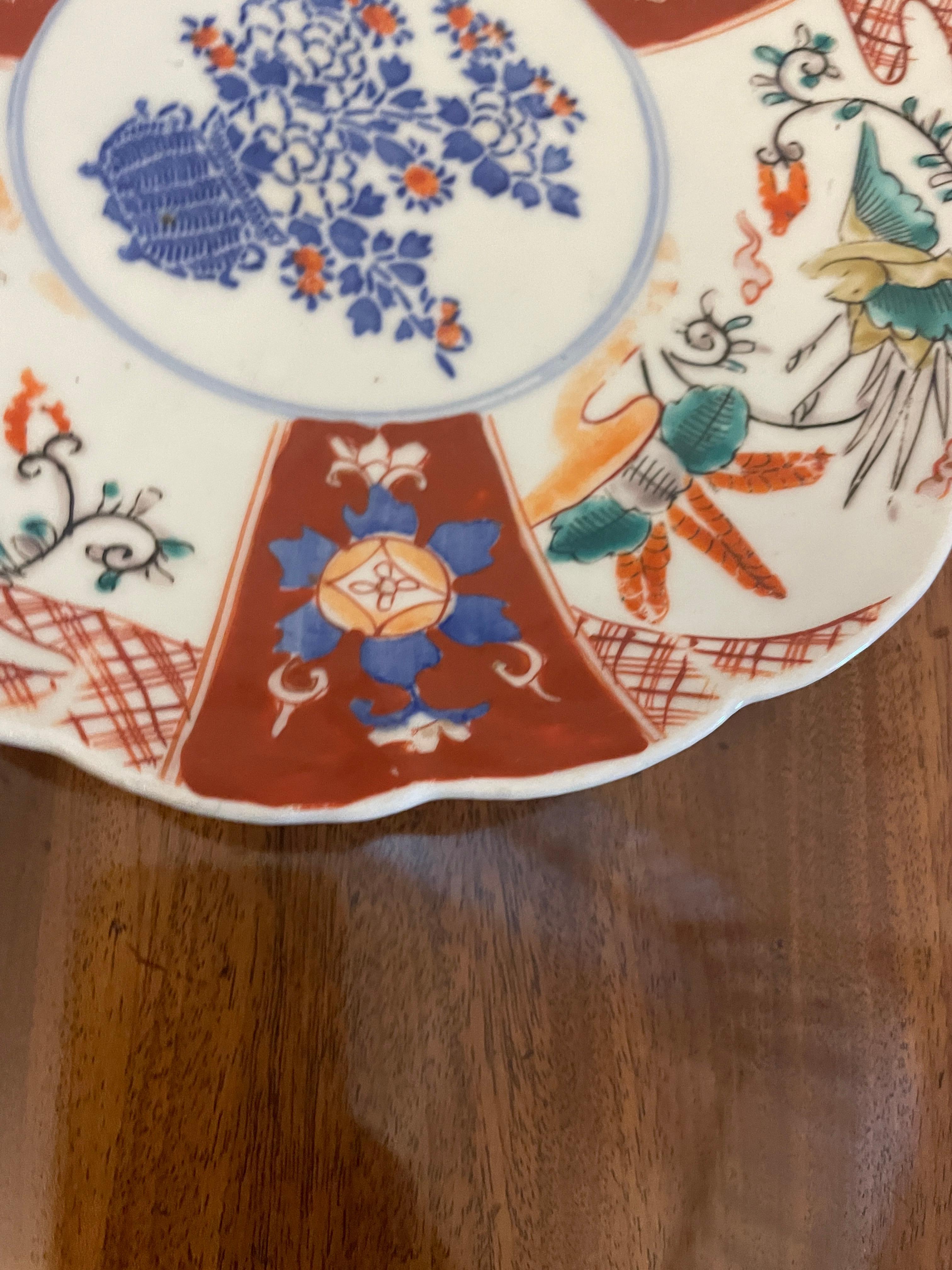 Two antique 19th century Japanese quality Imari plates having quality hand painted decoration in wonderful red, blue, orange, green, yellow and white colours 


In lovely original condition


Dimensions
Height 3 cm
Width 22 cm
Depth 22 cm


Dated