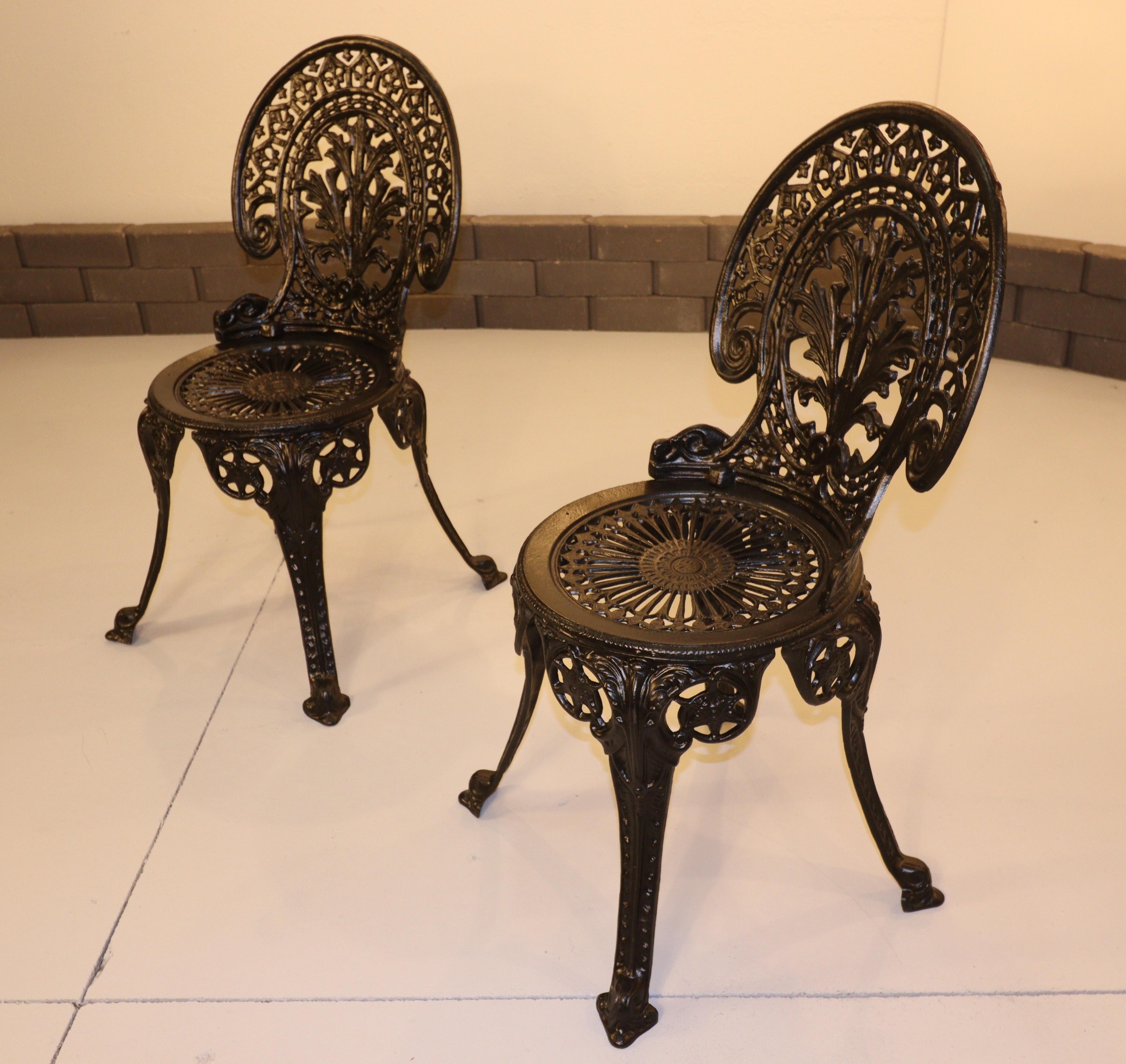 Transform your outdoor space with these beautiful antique baroque-style garden chairs crafted from heavy cast iron. Each chair weighs 35 lbs.

These chairs feature intricate scrollwork and an ornate design that adds a touch of elegance to any