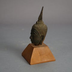 Two Antique Cast Bronze Mounted Tibetan Buddha Heads  18thC