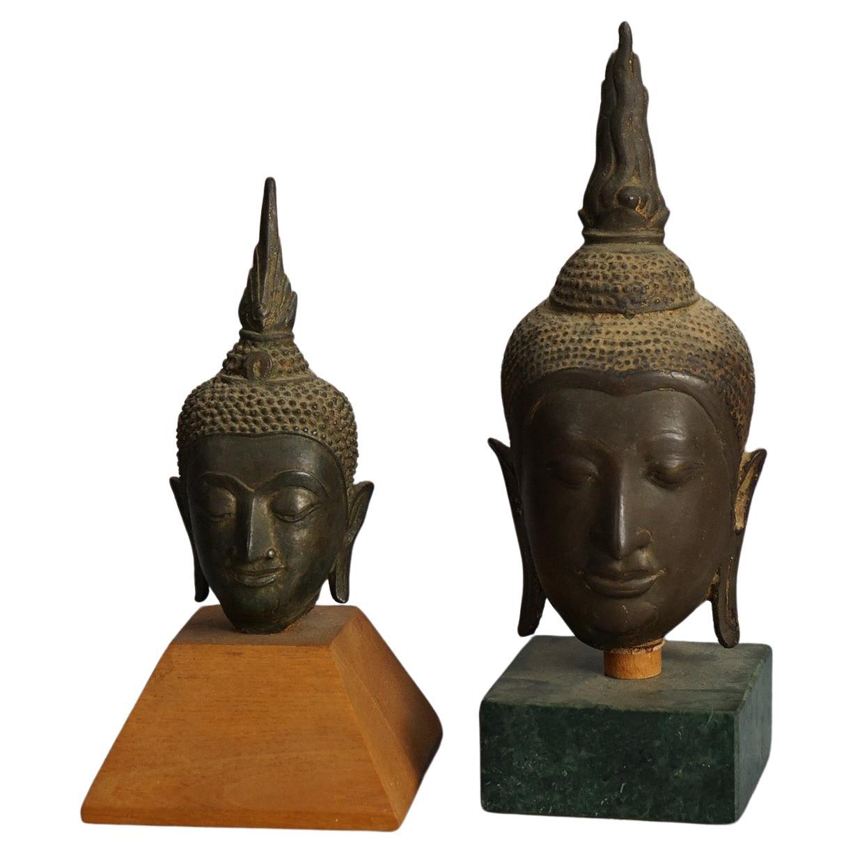 Two Antique Cast Bronze Mounted Tibetan Buddha Heads  18thC For Sale