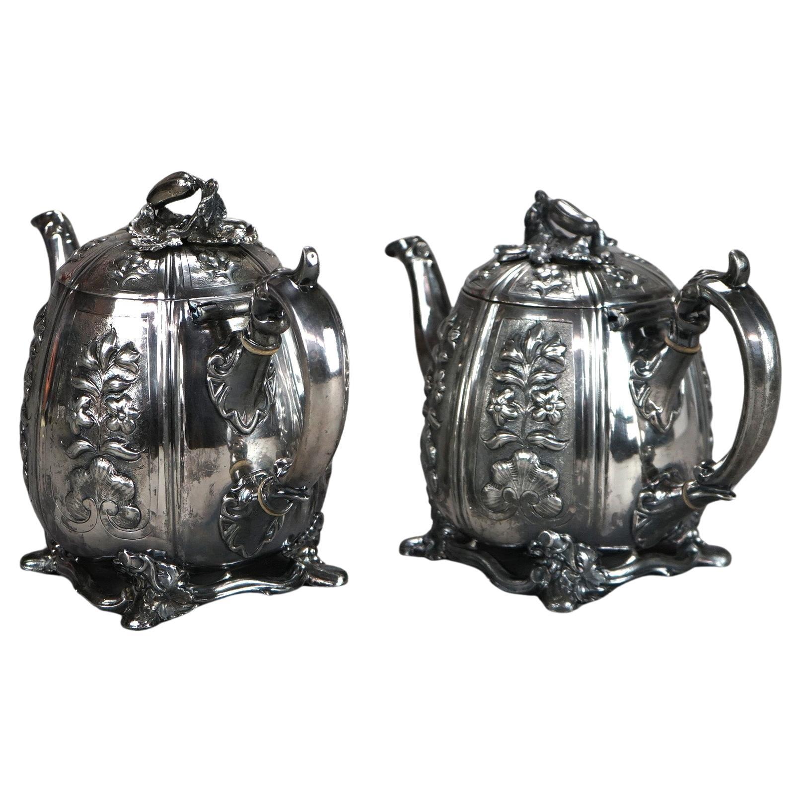 Two Antique English Sheffield Silver Plated Tea Pots with Garden Elements including Embossed Flowers, Vegetable Finials, and Leaves, C1890

Measures - taller 7.25