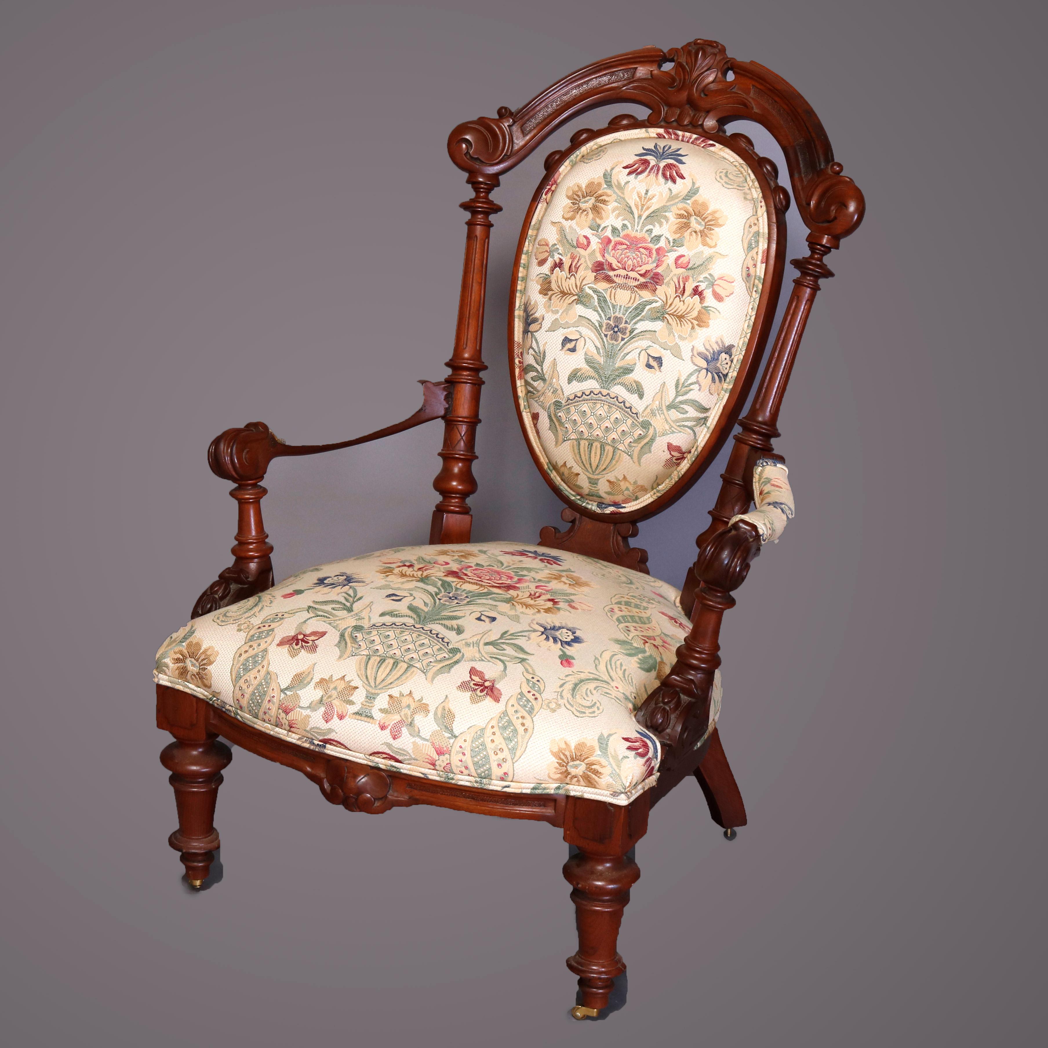 A set of two French Victorian Renaissance Revival parlor chairs offer carved walnut frames with Fluer de Lis crest having flanking scroll and acanthus decorated rail and reeded columns surmounting panier de fleurs upholstered backs and seats raised
