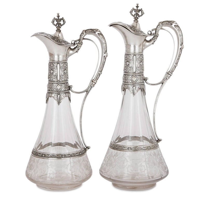 Two Antique German Repousse Silver and Crystal Glass Jugs For Sale at