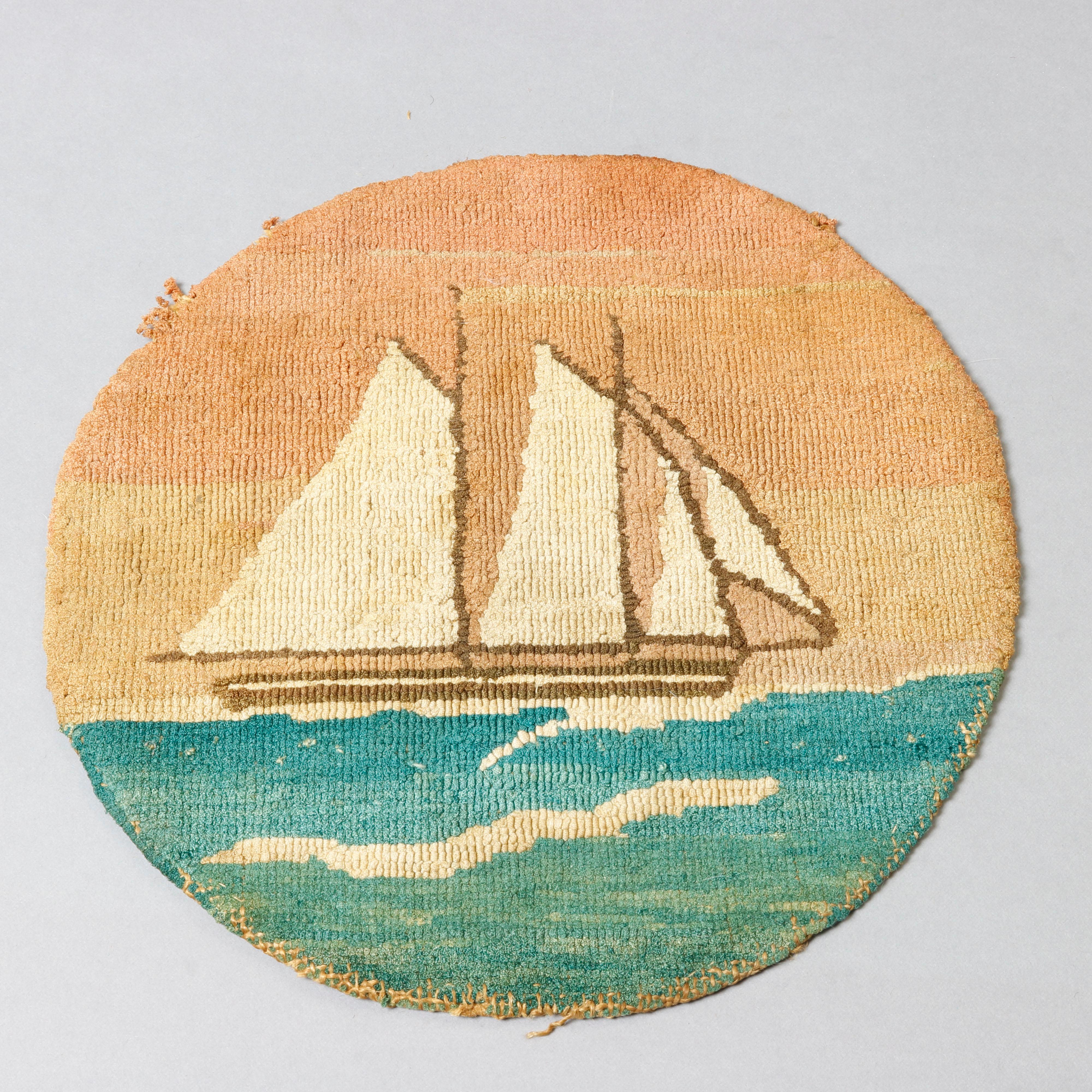 Two antique Grenfell Labrador, newfoundland hand knotted mats including one seascape with tall mast sailing ship and owned with polar bear on iceberg, original labels as photographed, circa 1920.

Measures-10.5